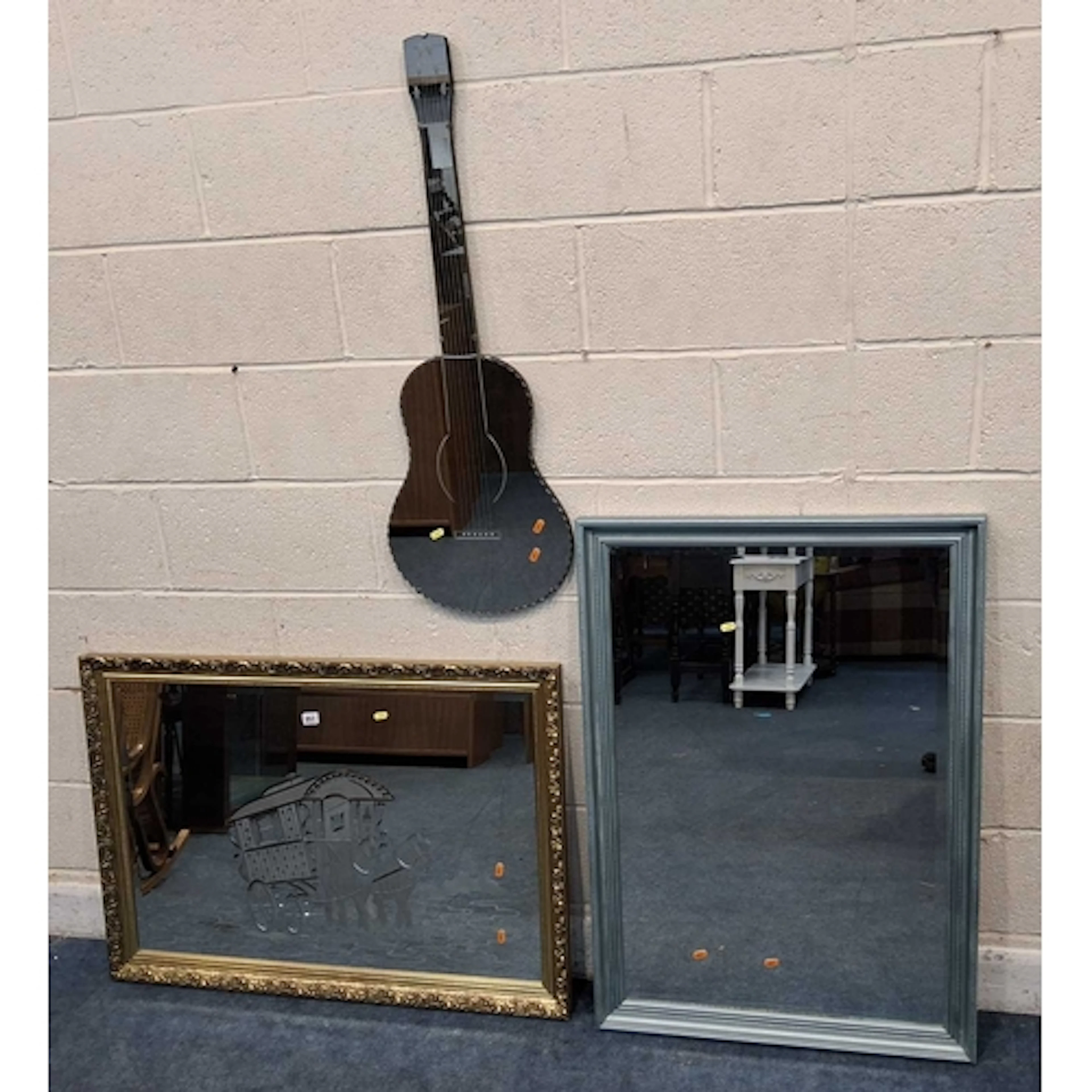 A GILT WOOD RECTANGULAR BEVELLED EDGE WALL MIRROR, with a ho...