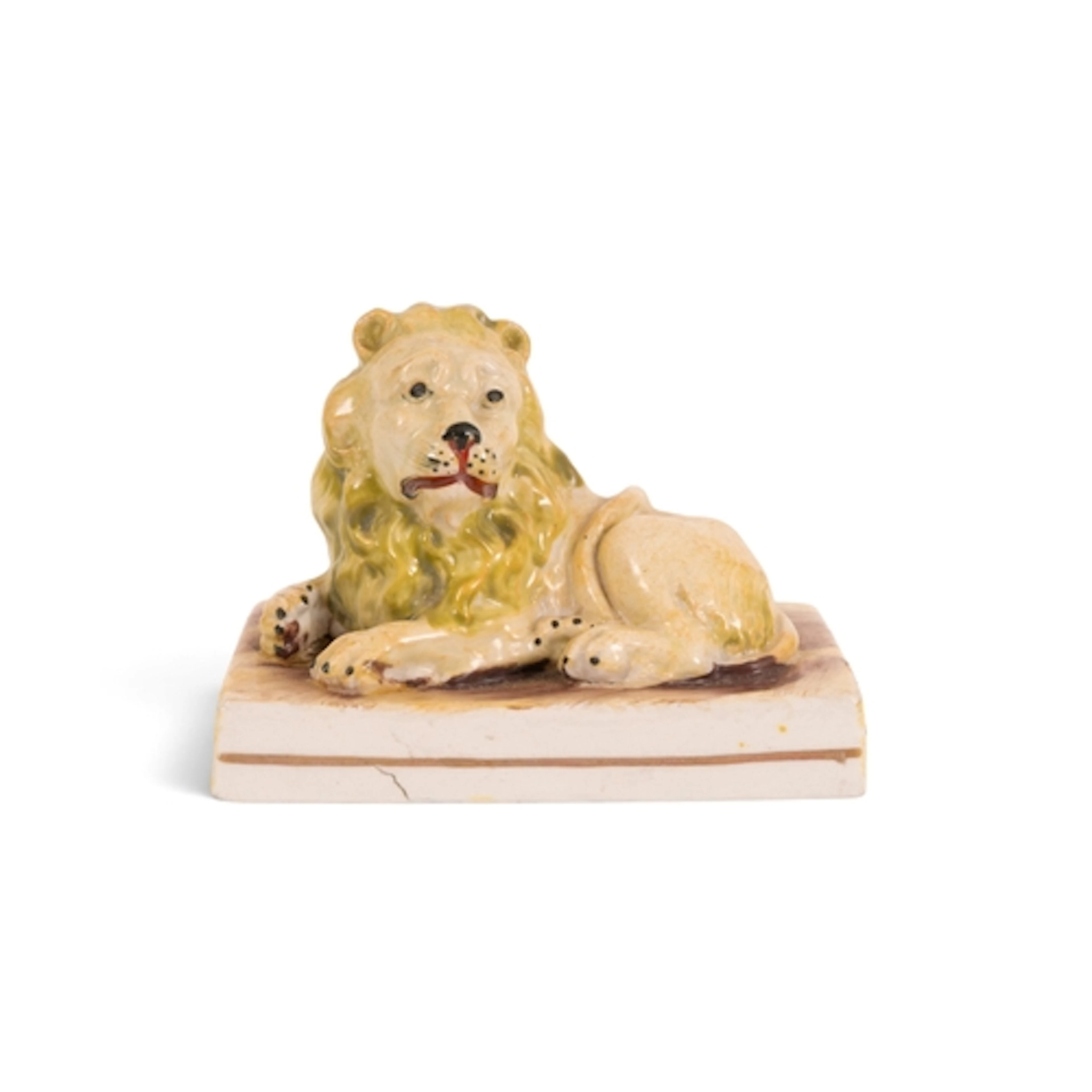 A Staffordshire figure of a lion, c.1820, probably Wood and ...