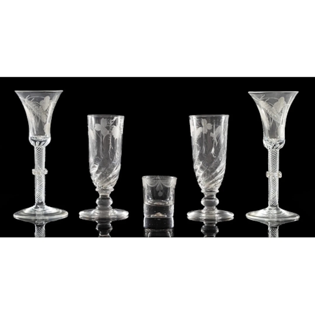 Two pairs of ale glasses one pair with funnel shaped bowls e...
