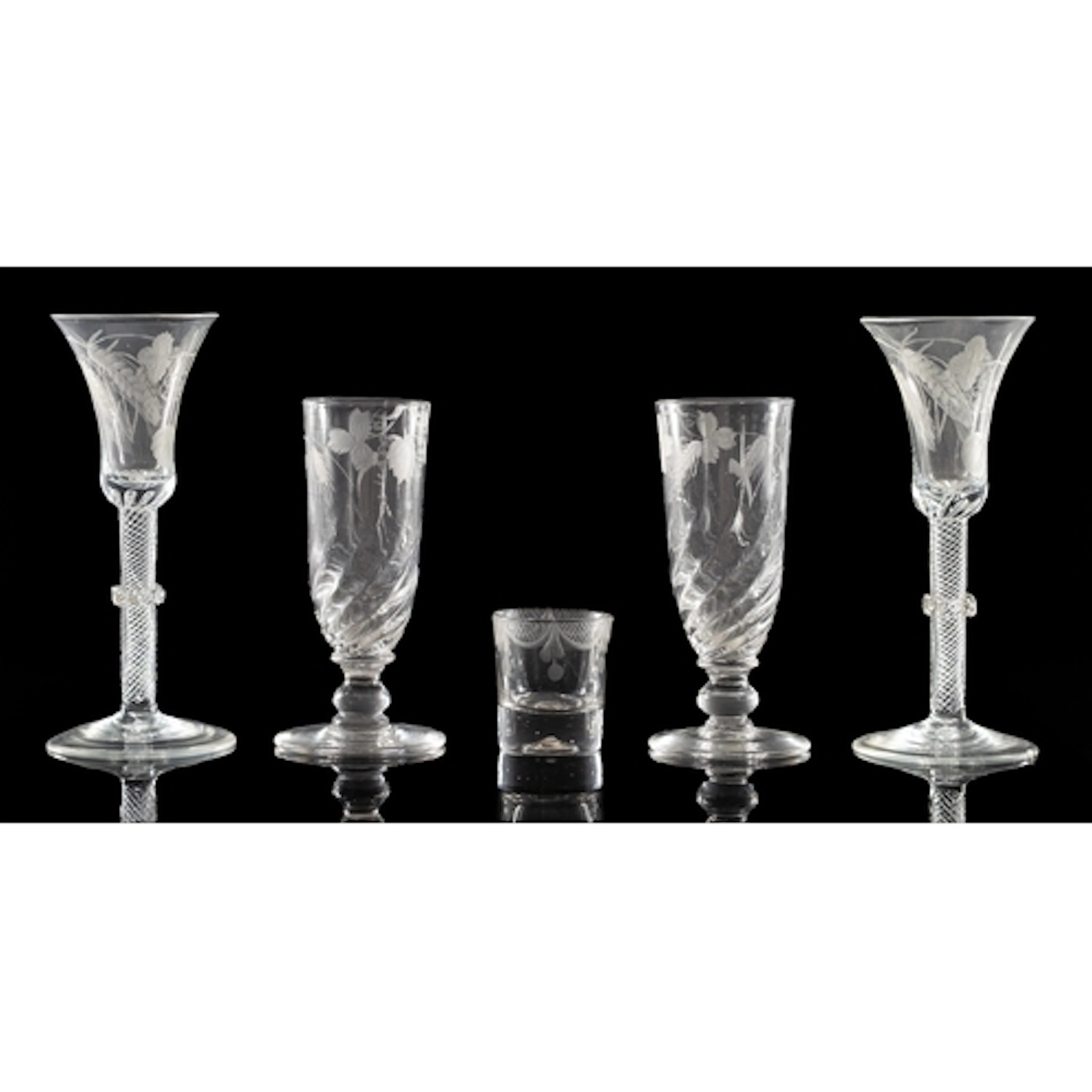 Two pairs of ale glasses one pair with funnel shaped bowls e...
