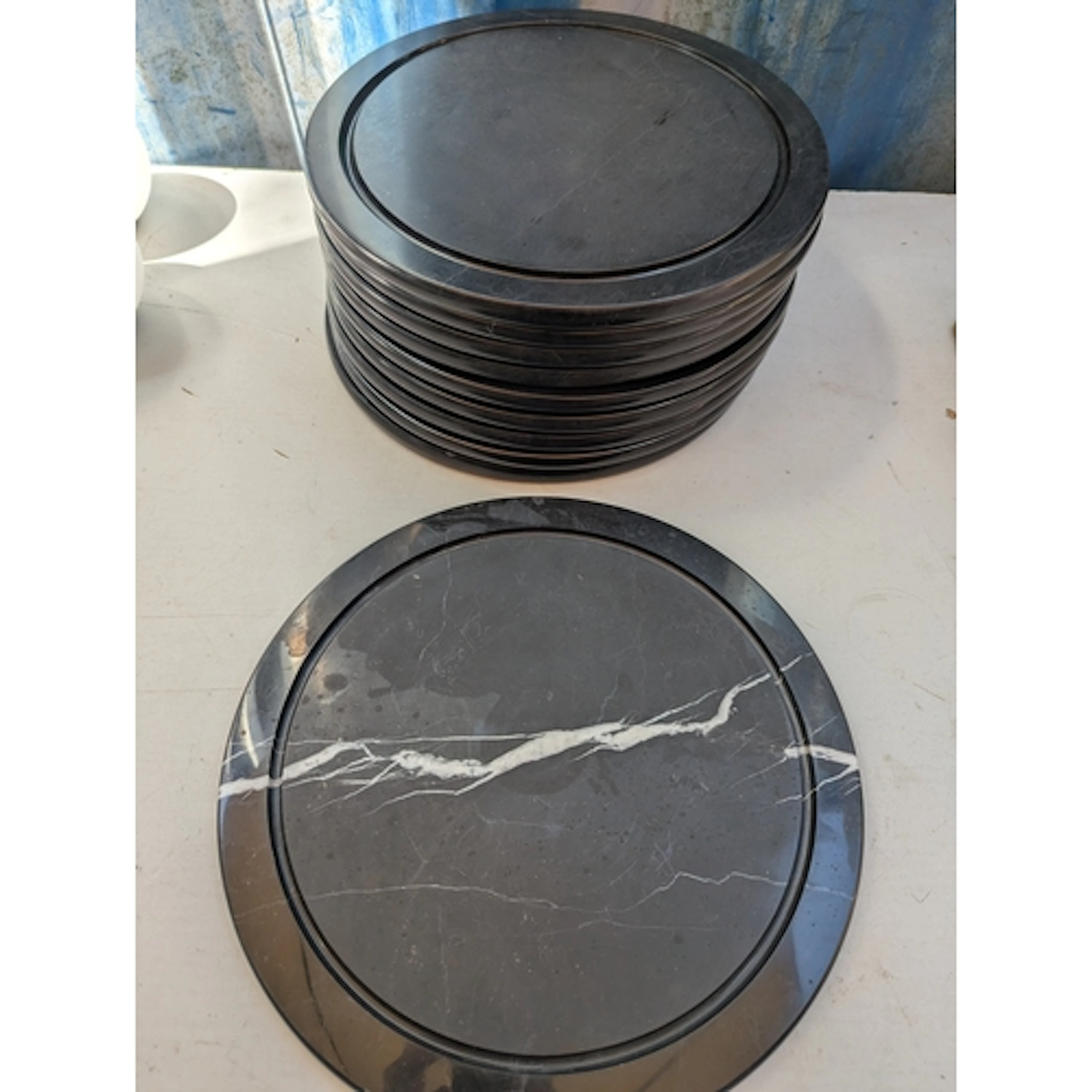 A set of John Lewis marble dinner plates Location: A2F If th...