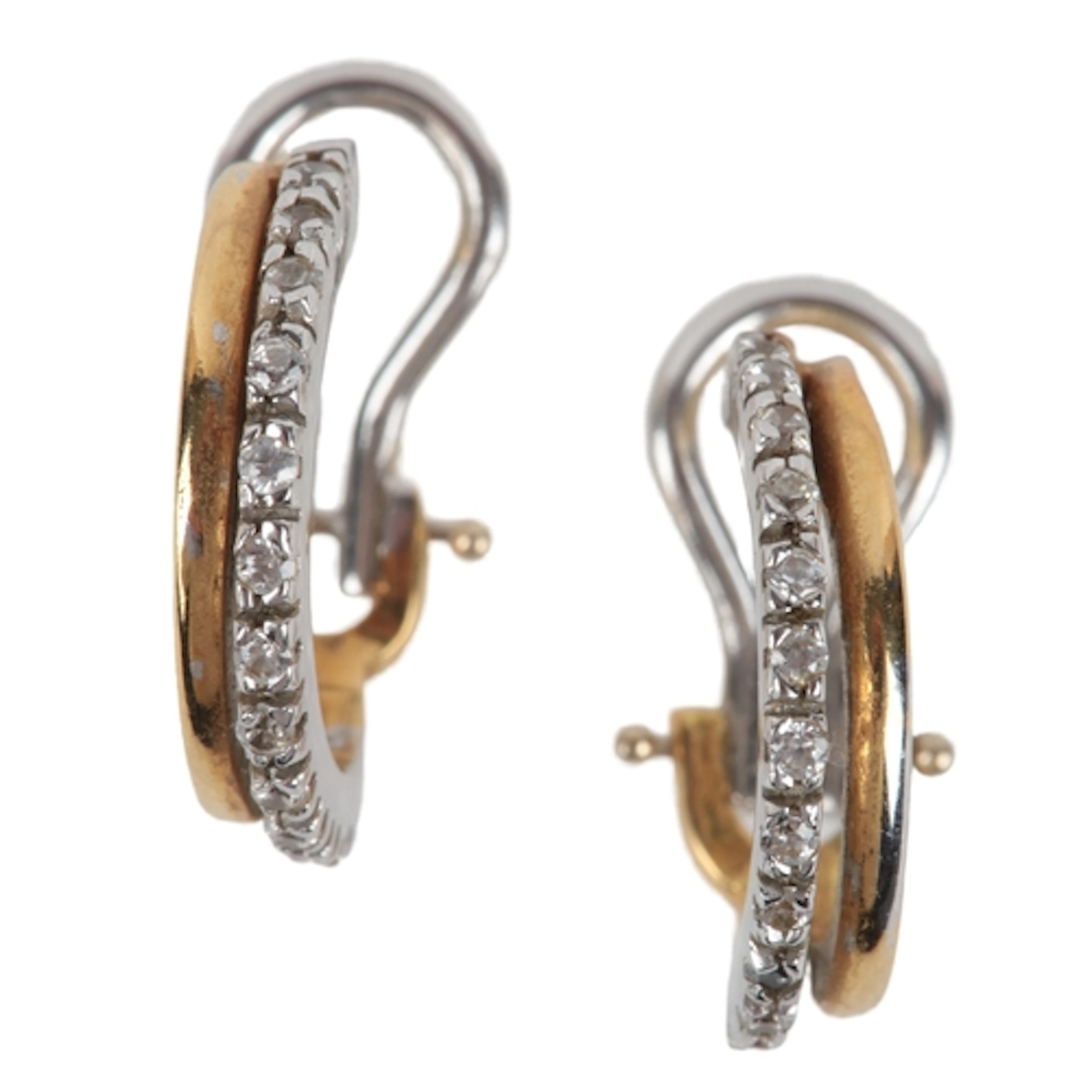A pair of gold and diamond earrings, designed as half hoops ...