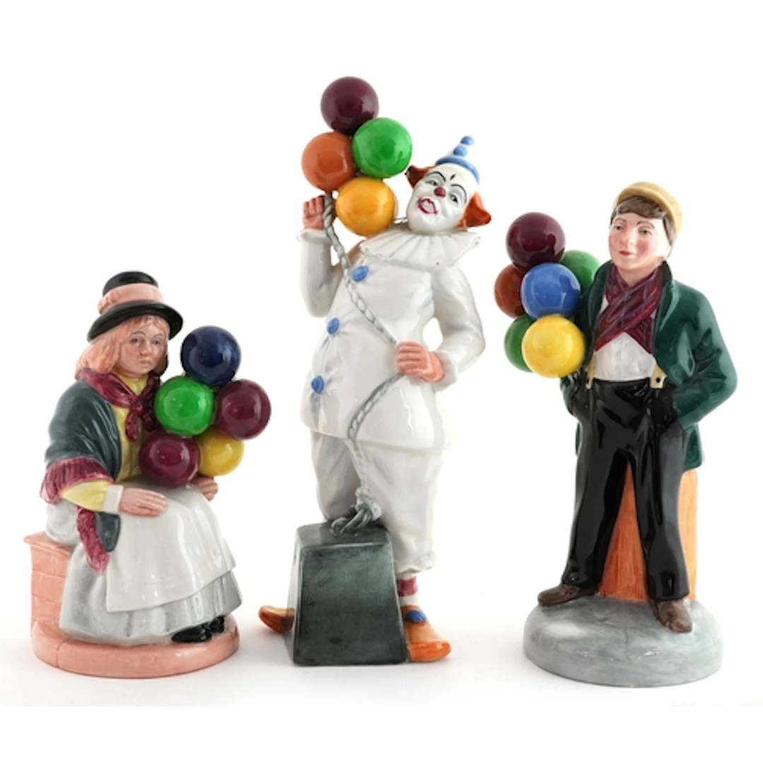 Three Royal Doulton figures comprising Balloon Man HN2934, B...