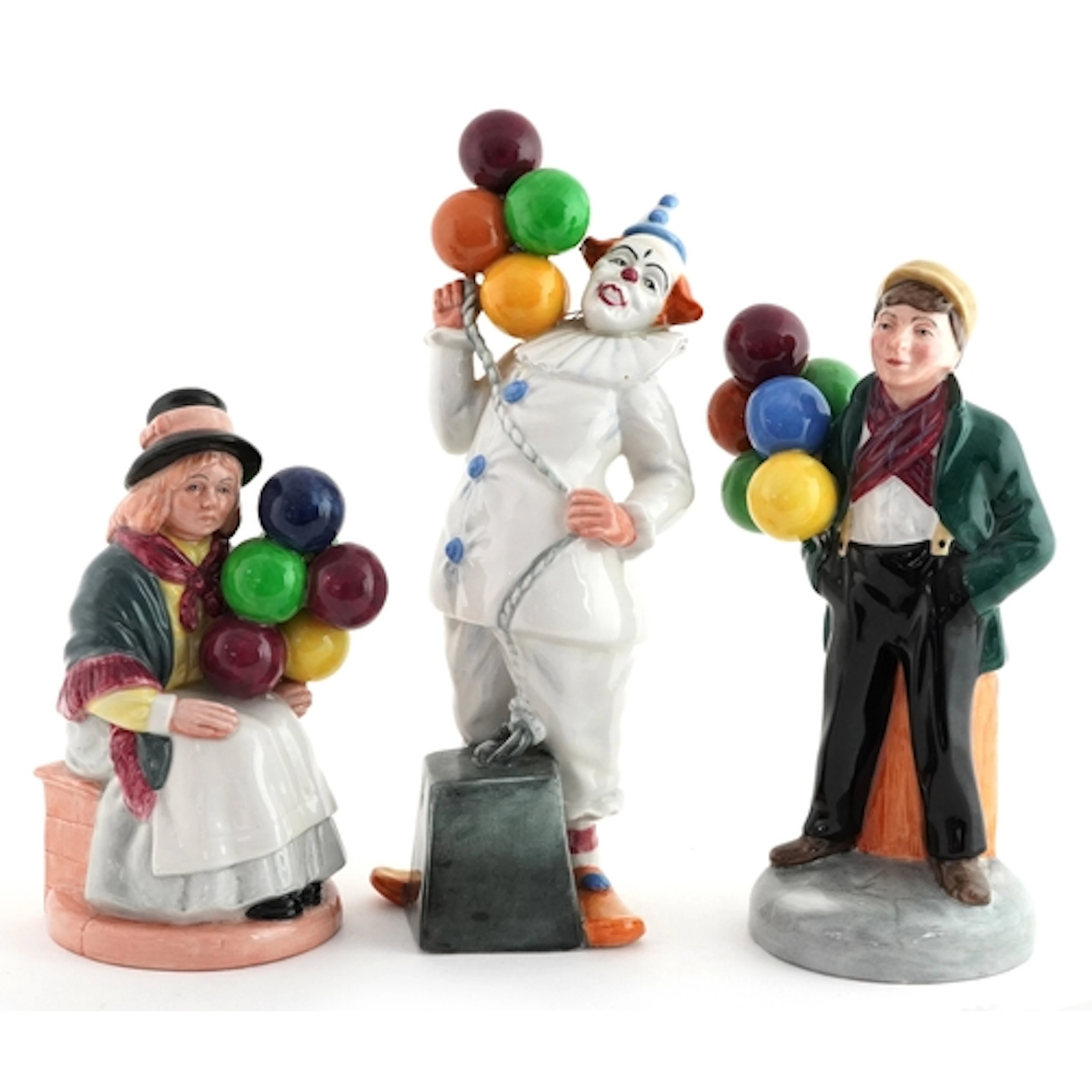 Three Royal Doulton figures comprising Balloon Man HN2934, B...