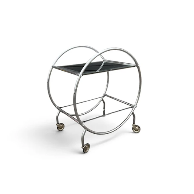 AN ART DECO CHROME AND GLASS DRINKS TROLLEY With circular fr...