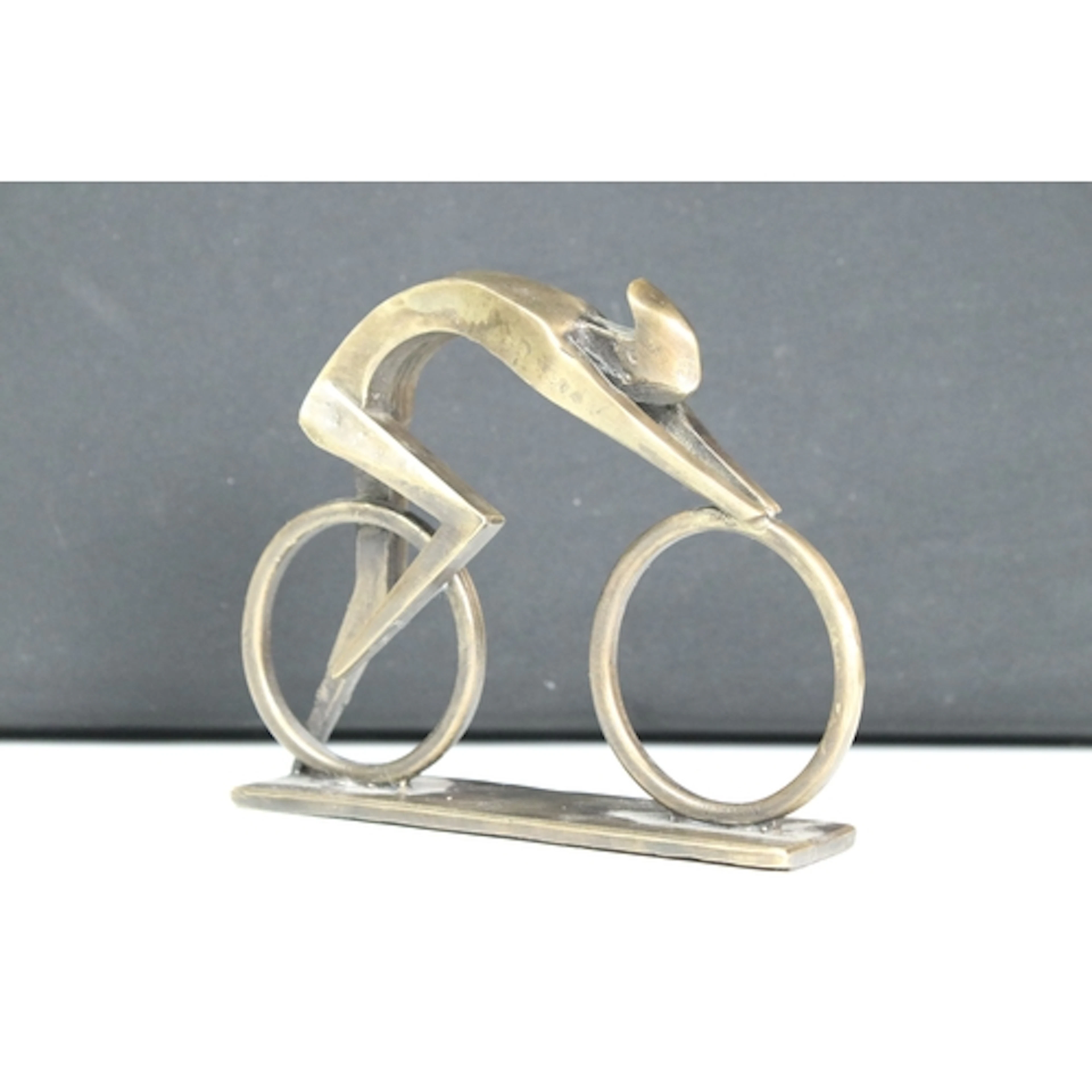 Abstract bronze figurine of a cyclist, height measures 11cm