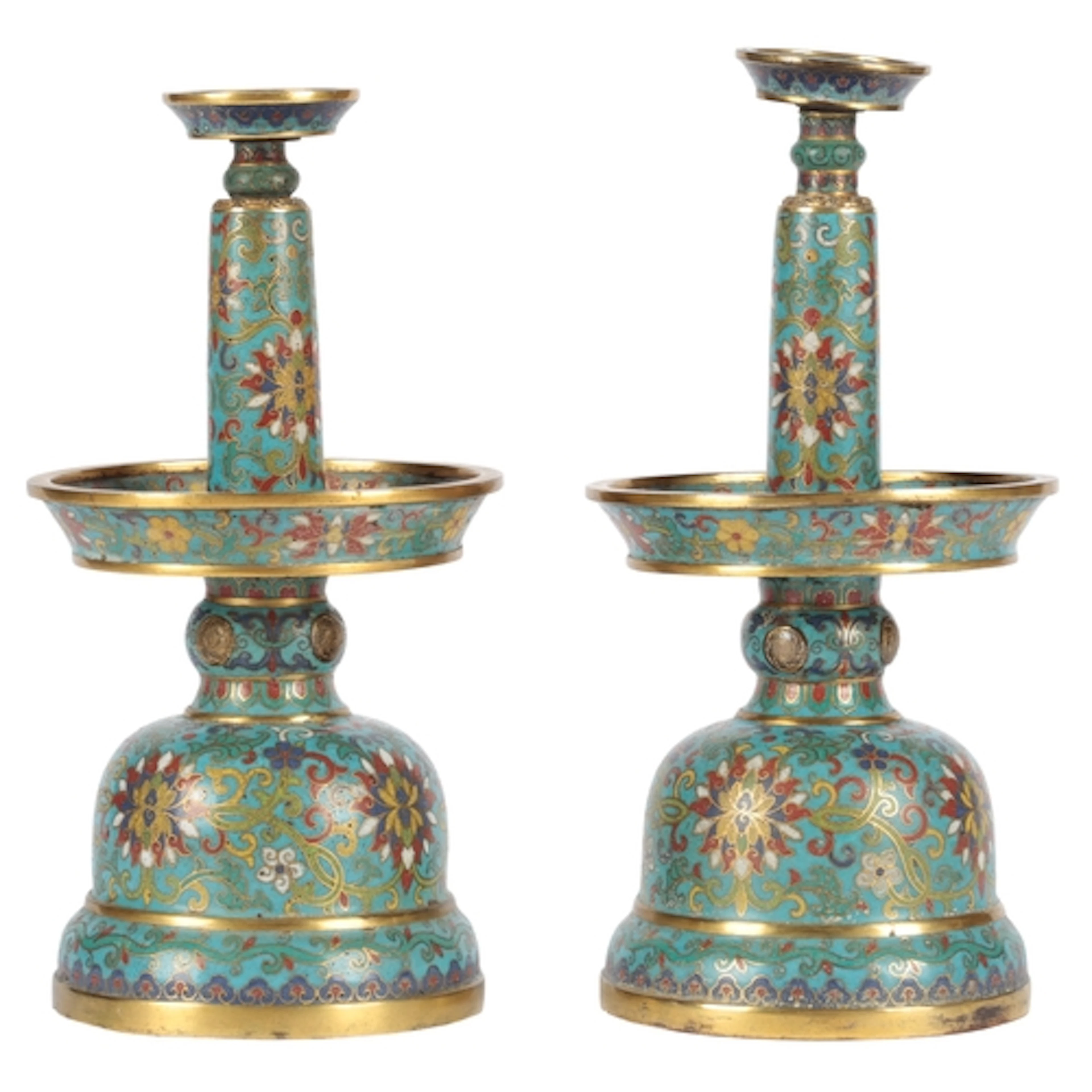 A rare pair of Chinese gilded cloisonné enamel 'lotus' candl...