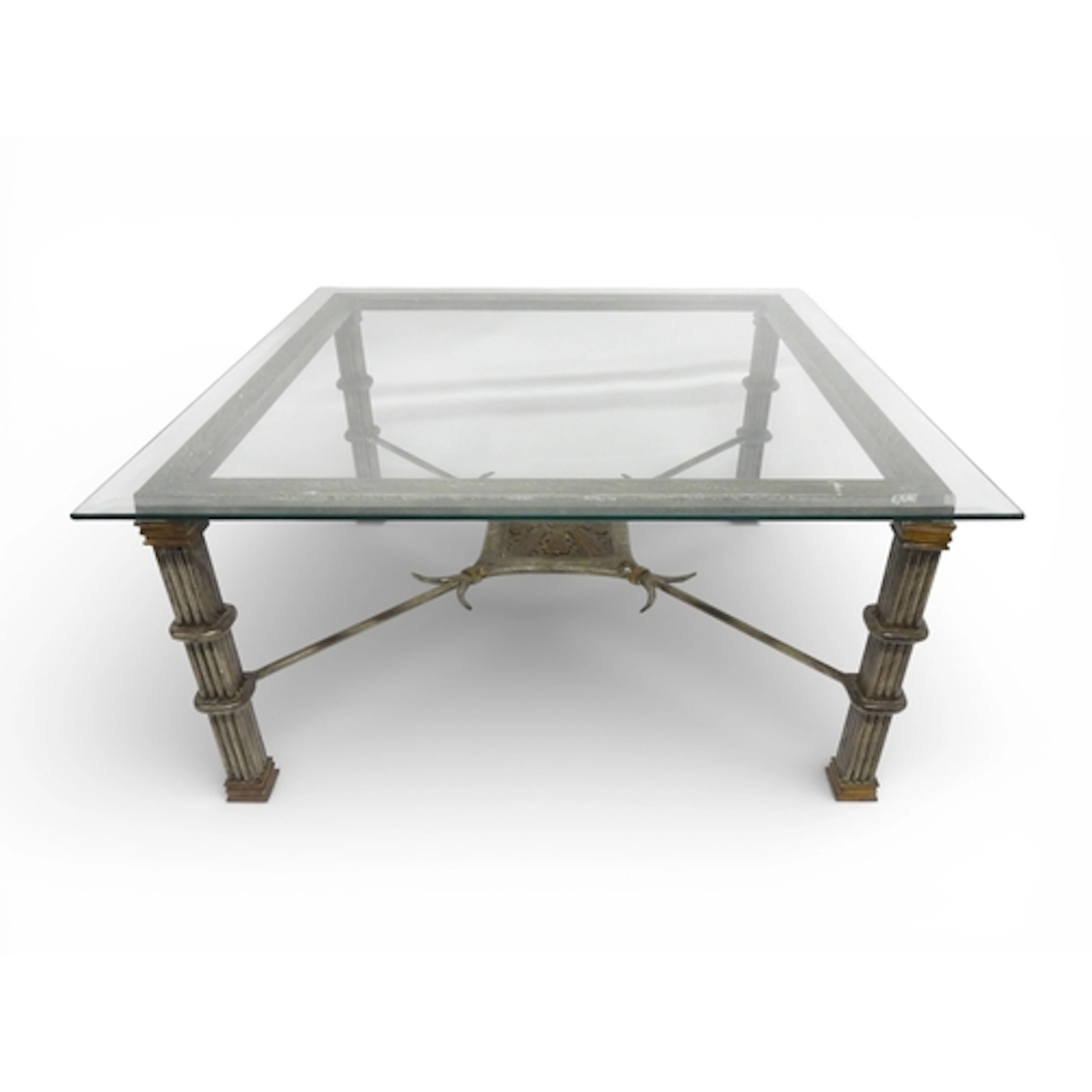 A 20TH CENTURY GLASS TOPPED COFFEE TABLE IN THE MANNER OF DI...