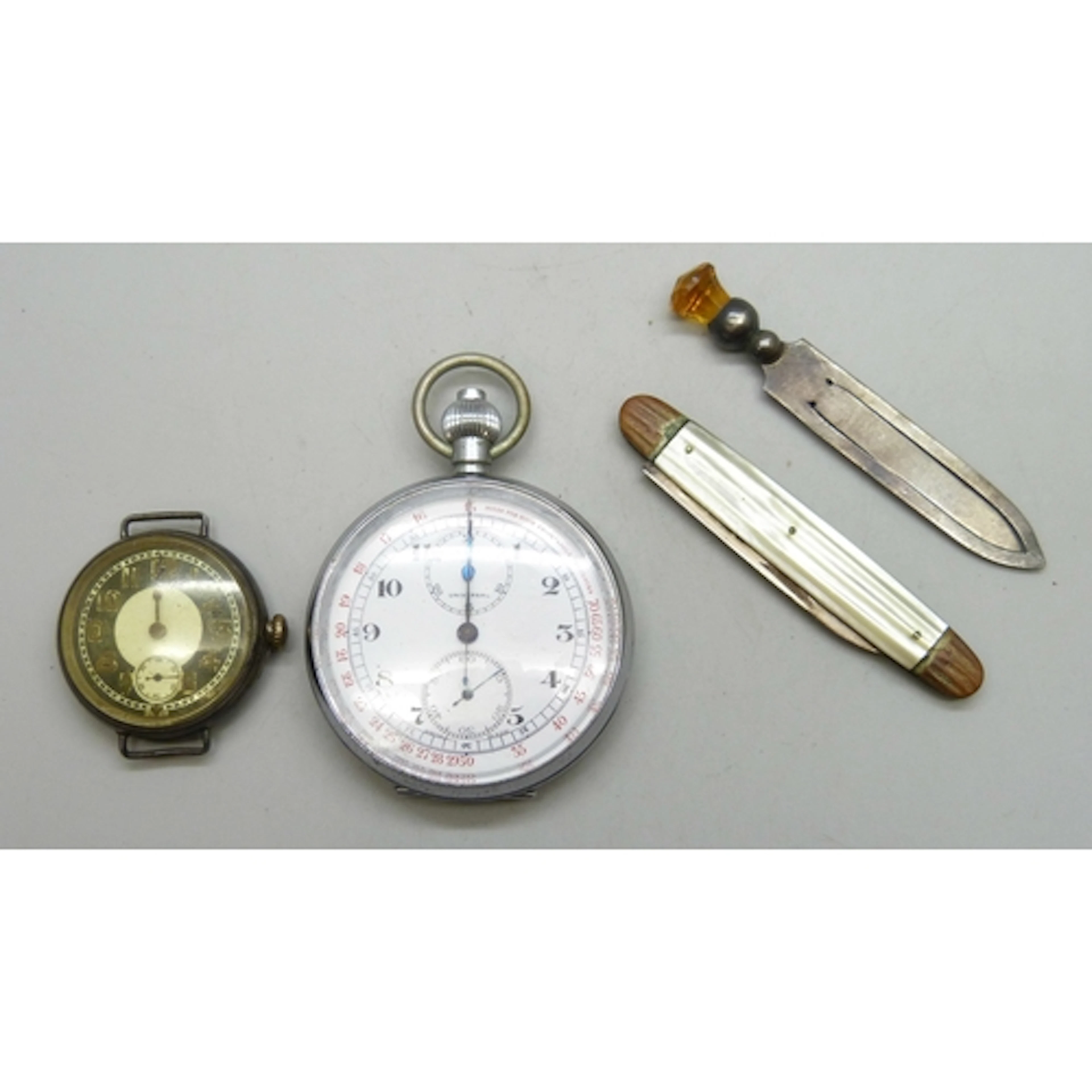 A Universal pocket watch, a silver cased trench watch with t...