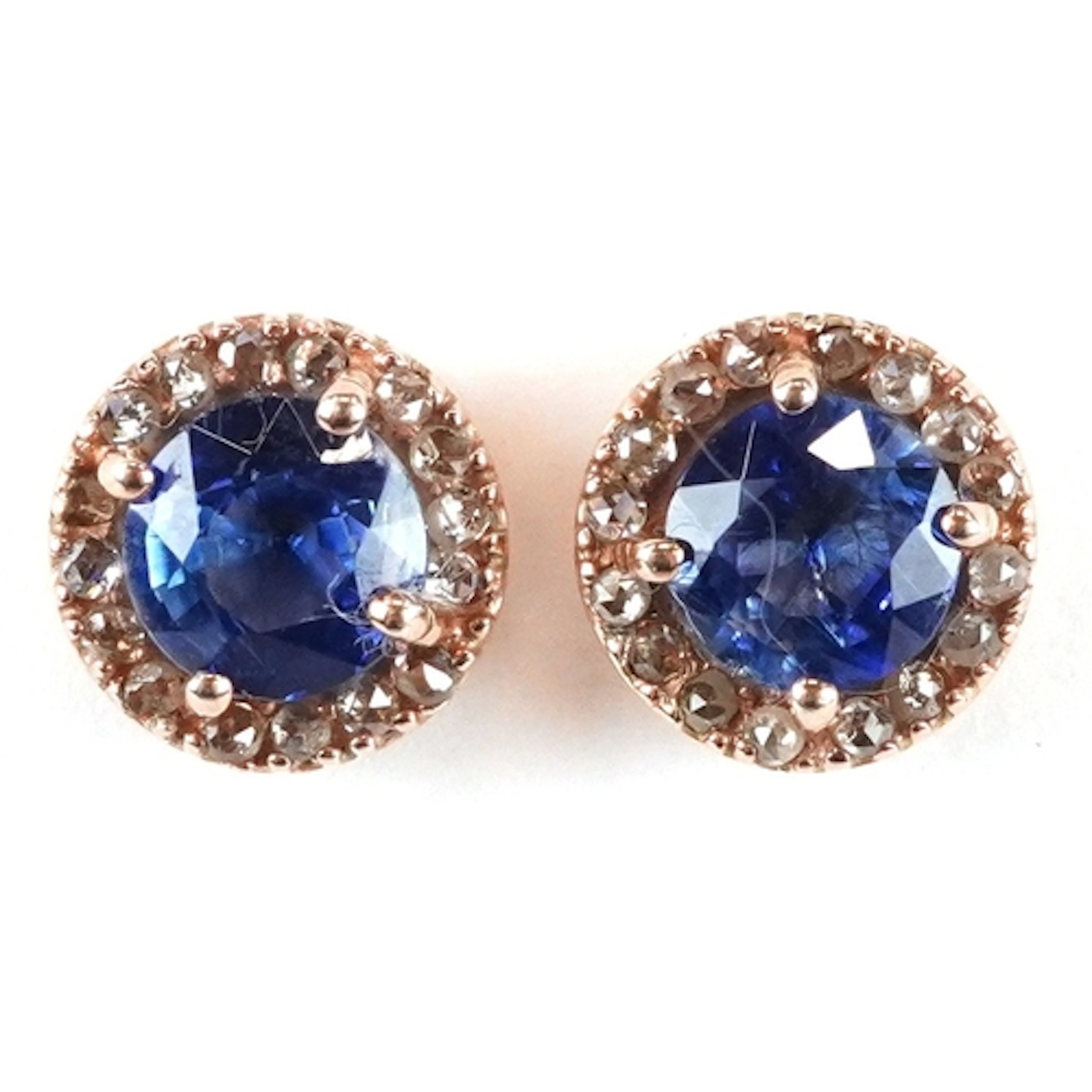 A pair of silver gilt kyanite and diamond halo stud earrings...