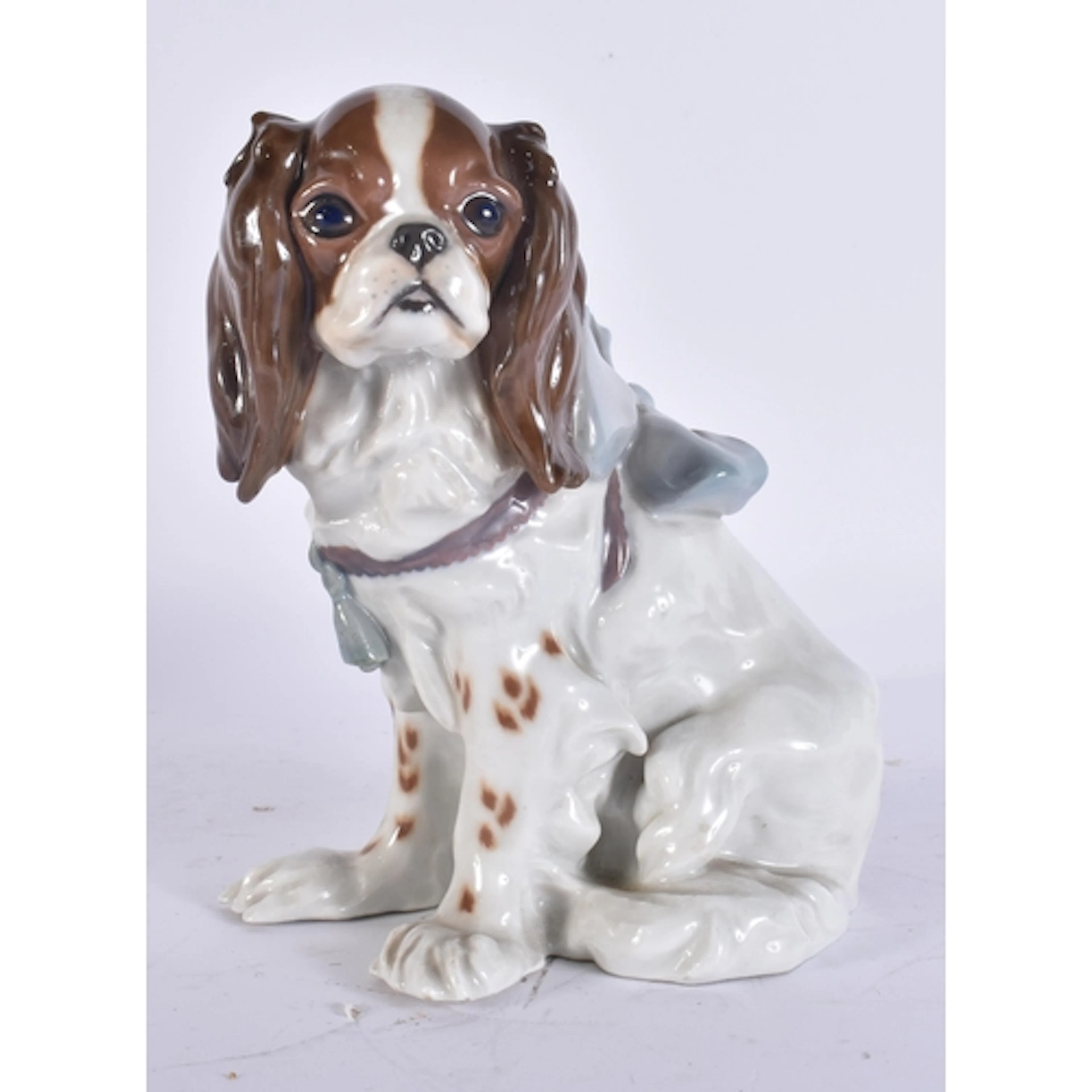 A MEISSEN PORCELAIN FIGURE OF A KING CHARLES SPANIEL No 187....