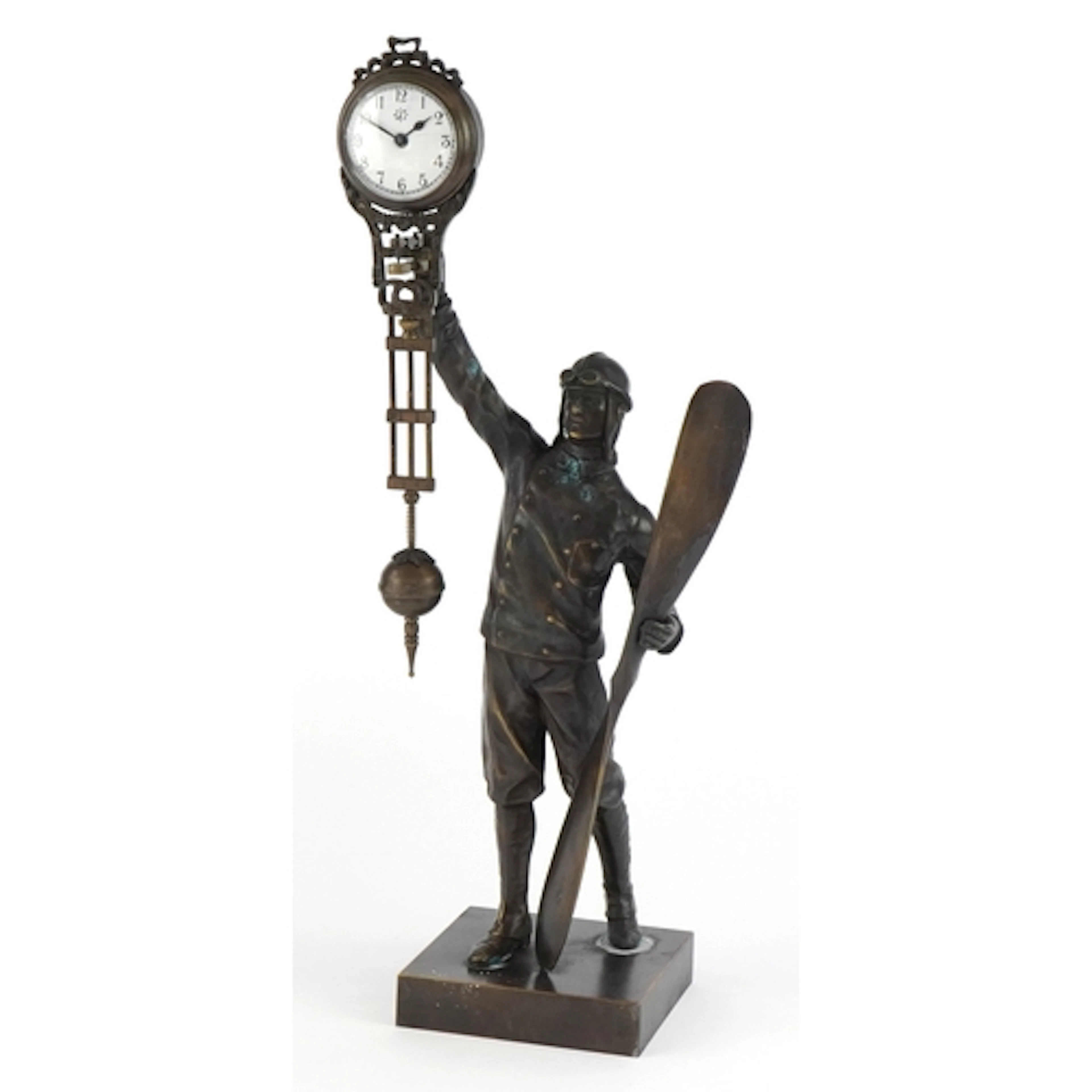 Military interest patinated bronze mystery clock in the form...