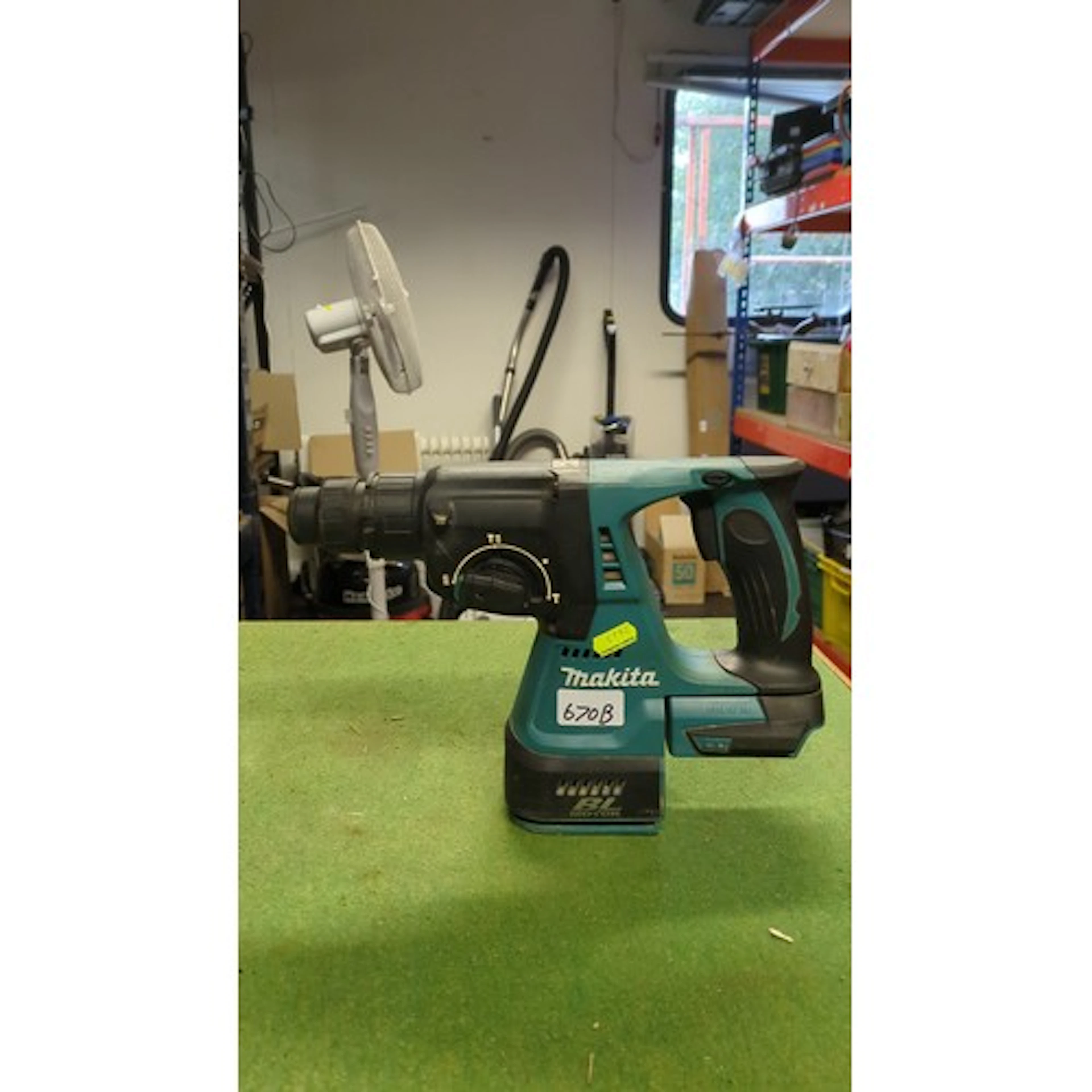 Makita DHR242 18V LXT cordless rotary hammer drill, 24mm cap...
