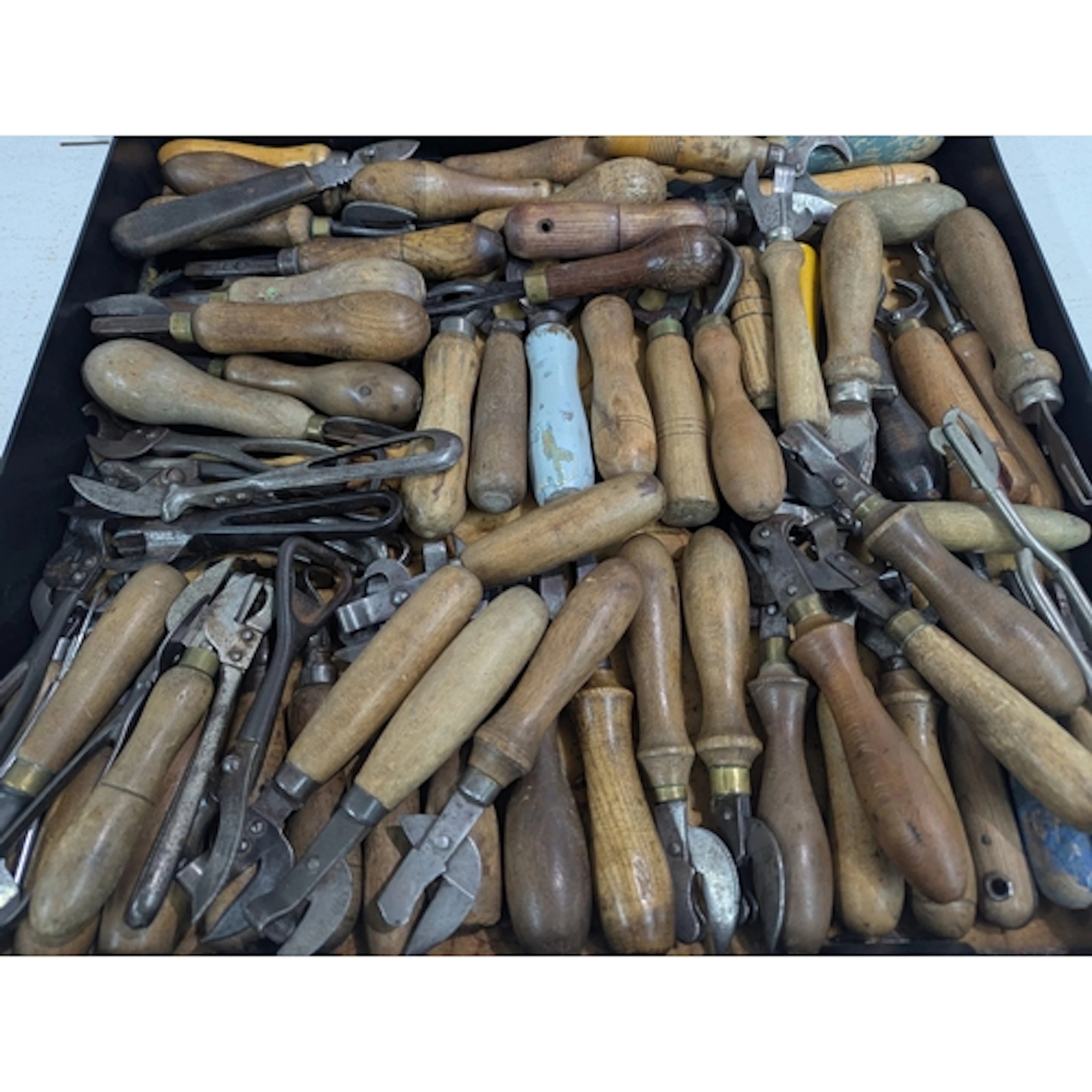 A collection of 19th century and later tin openers, mainly h...