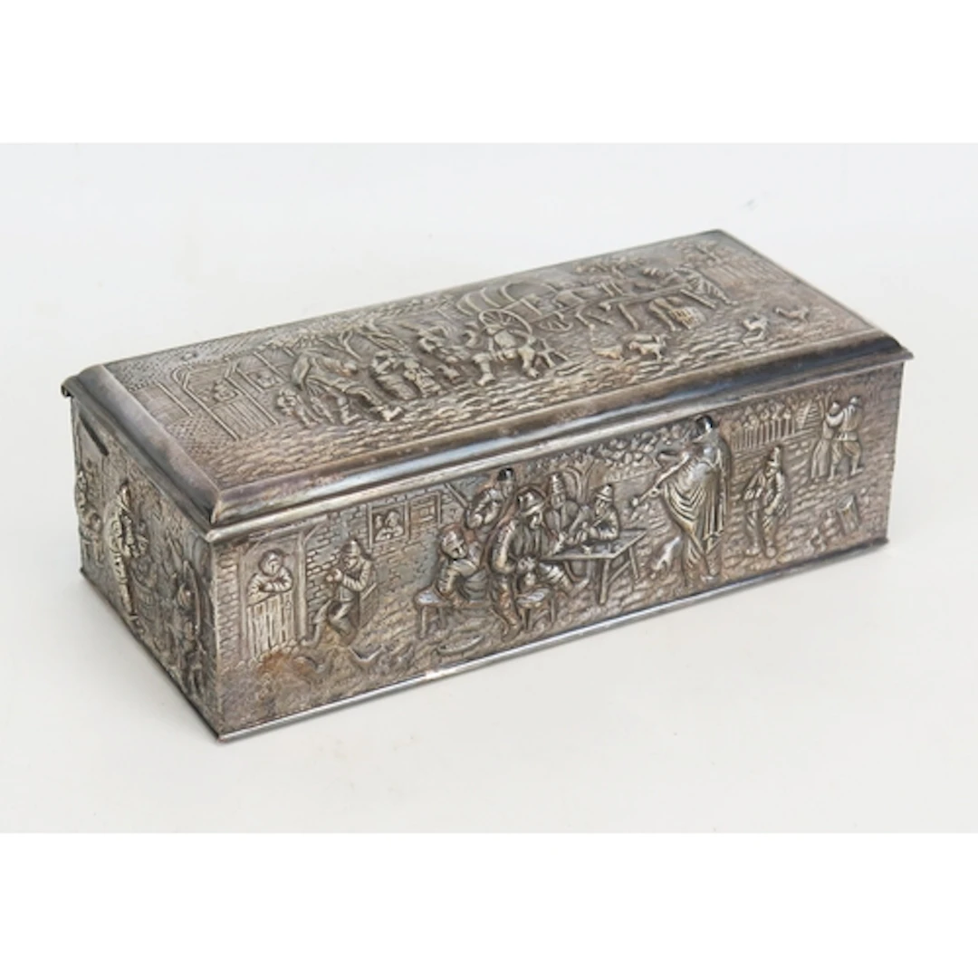 A continental silver backed box with embossed farmyard decor...