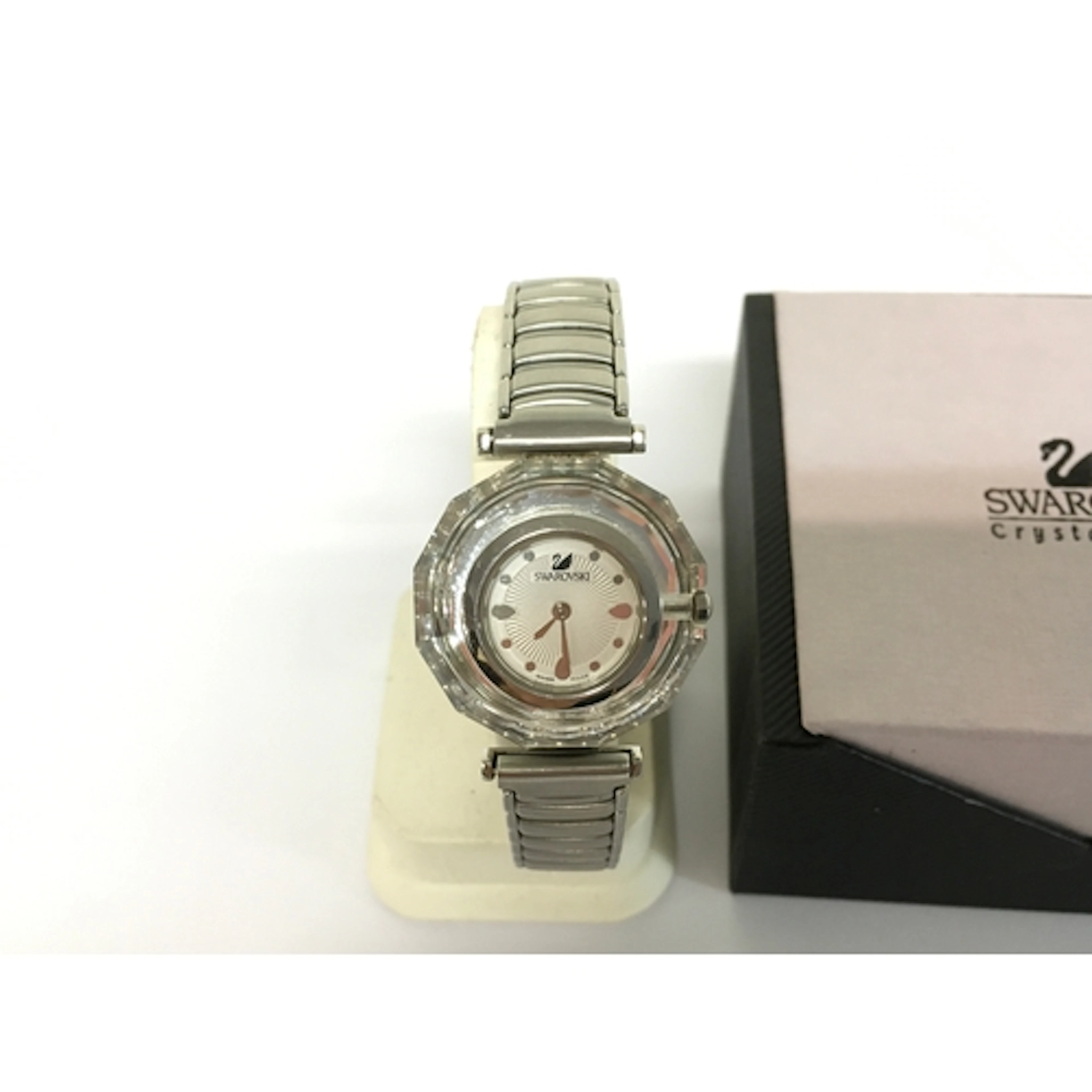 Swarovski Crystal Time watch features a distinctive clear cr...