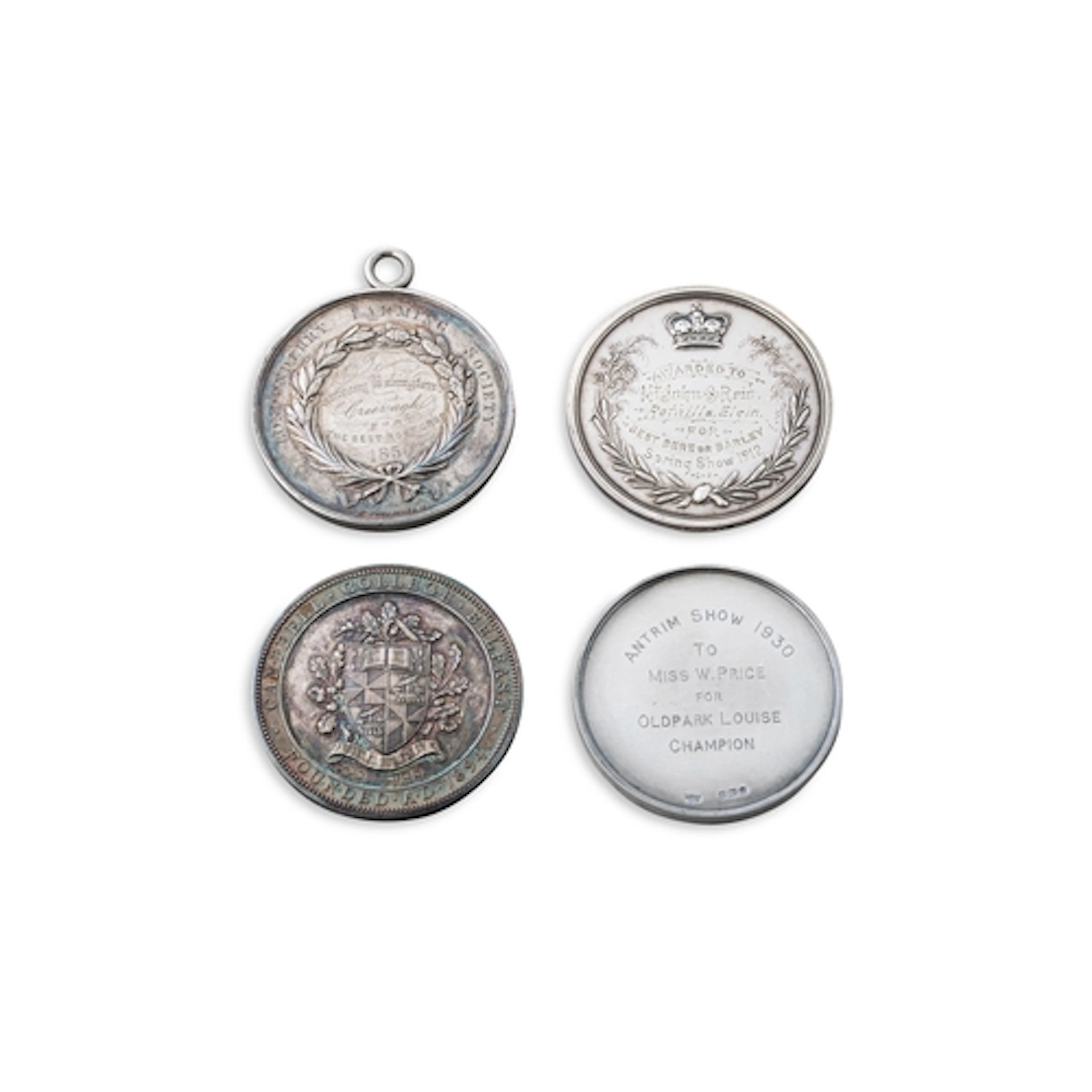 A SET OF FOUR AGRICULTURAL SILVER MEDALS, from N.Ireland & S...