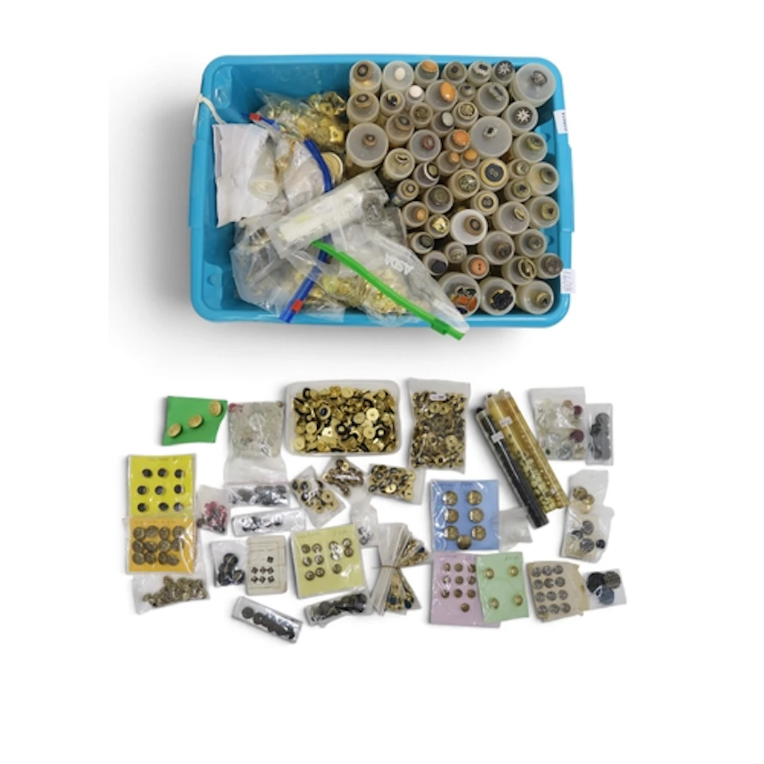 A collection of vintage buttons to include gold plated examp...