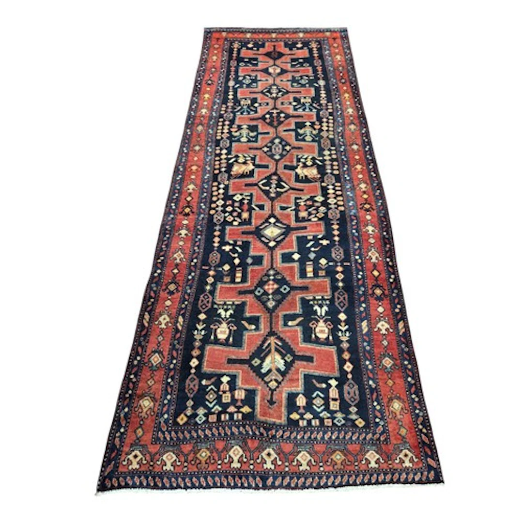 A deep ground full wool pile handwoven Persian Sarouk Runner...