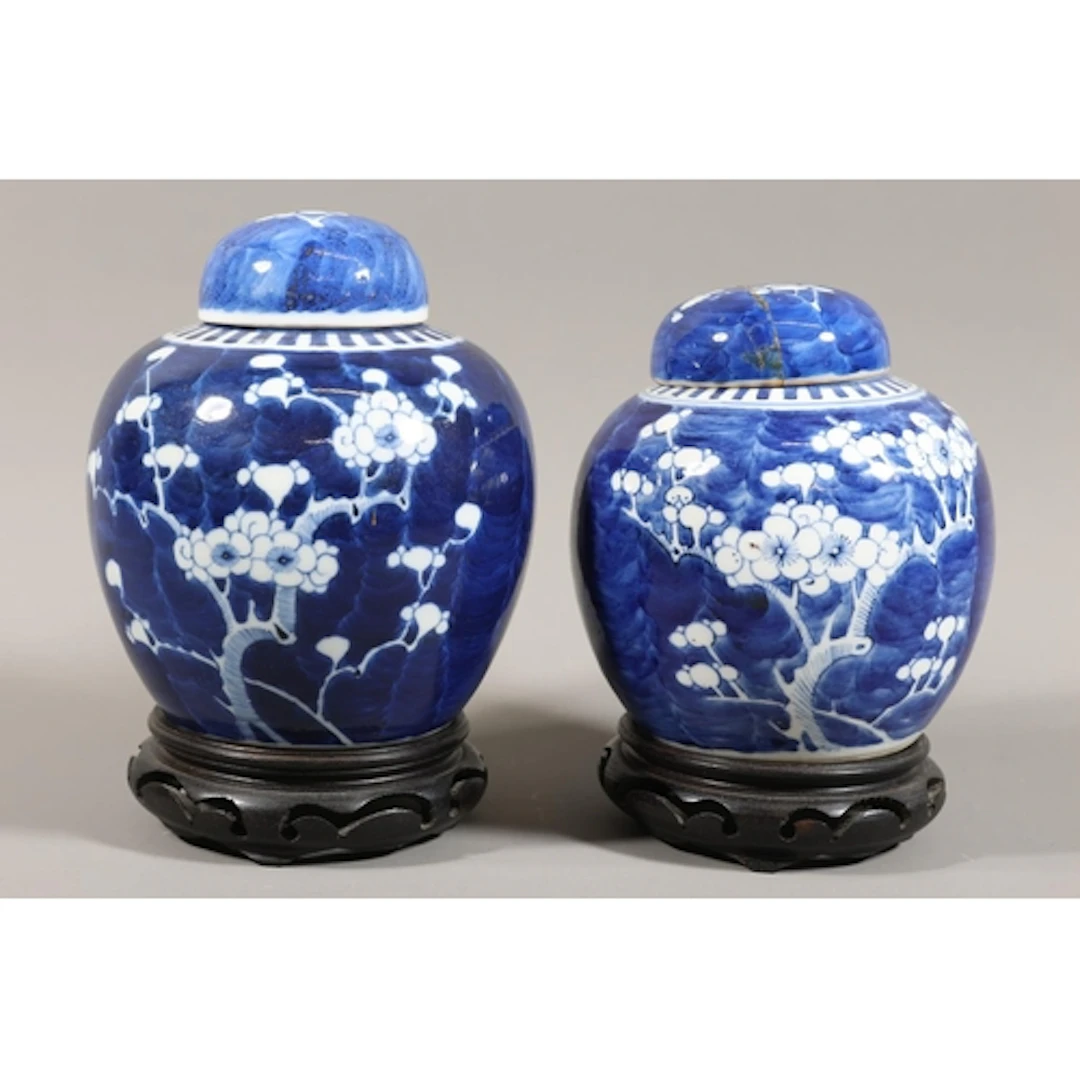 Pair of blue and white ginger jars and covers decorated with...