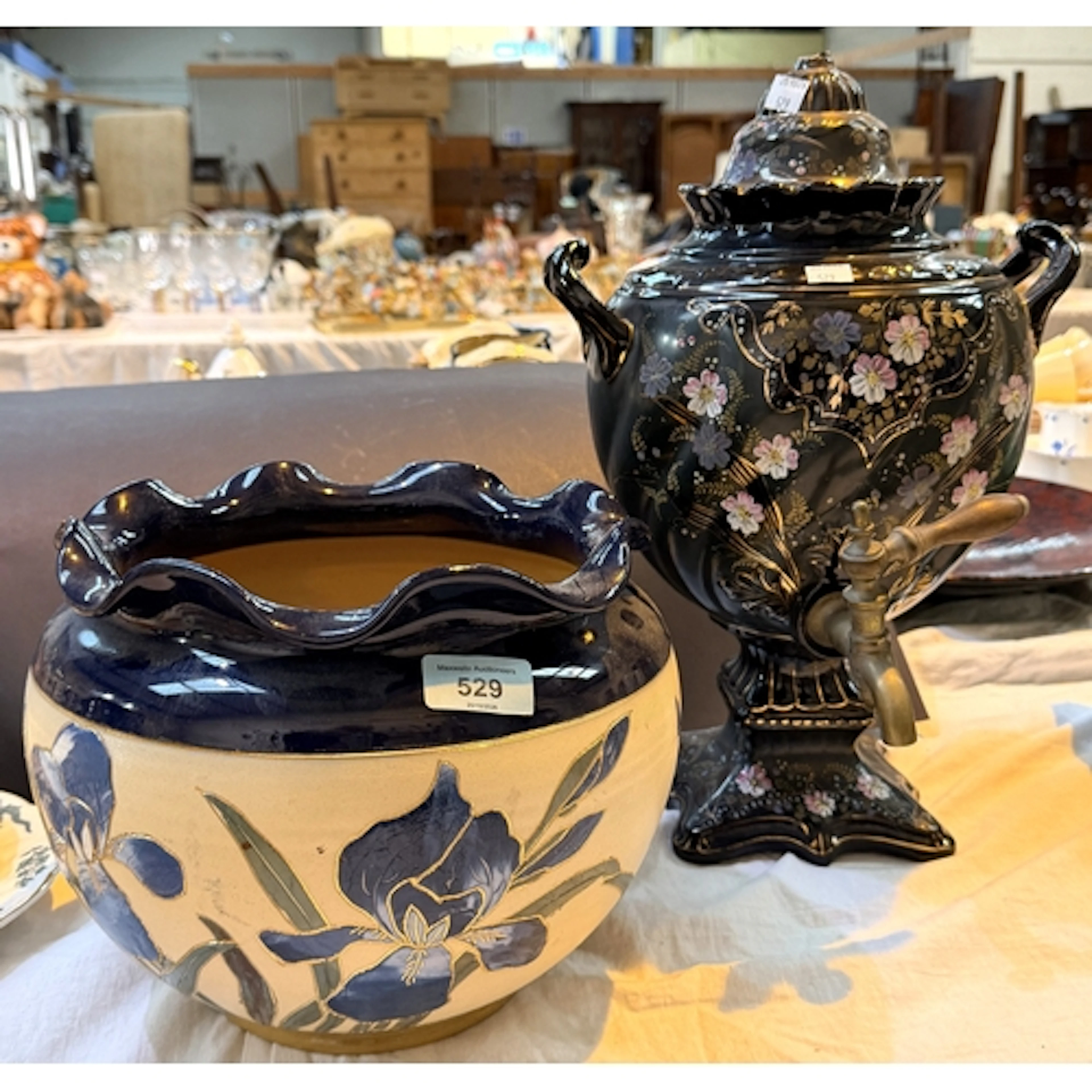 A Lovatts jardiniere decorated with a wide band of flowers; ...