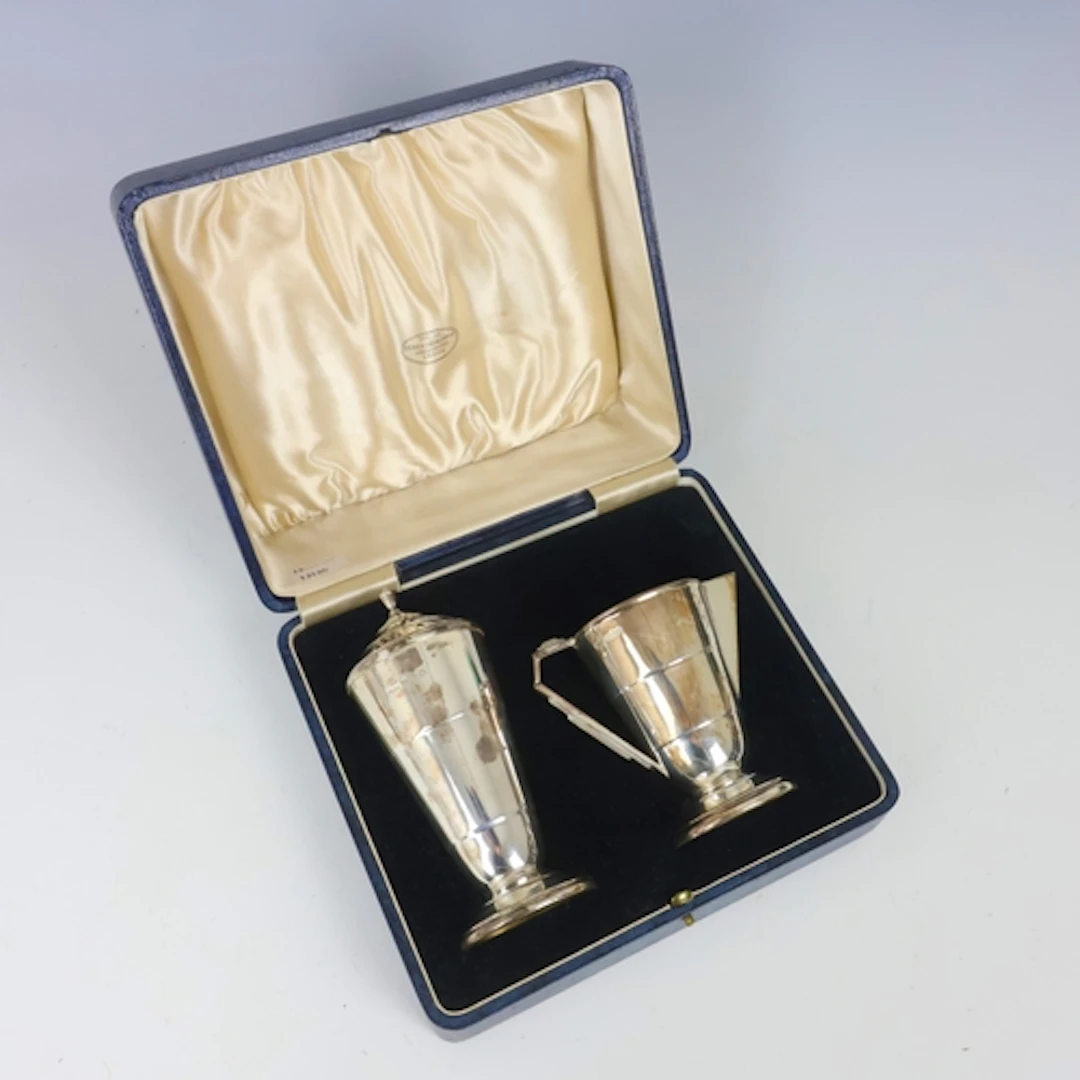 A George V near matched silver set, Joseph Gloster Ltd, Birm...