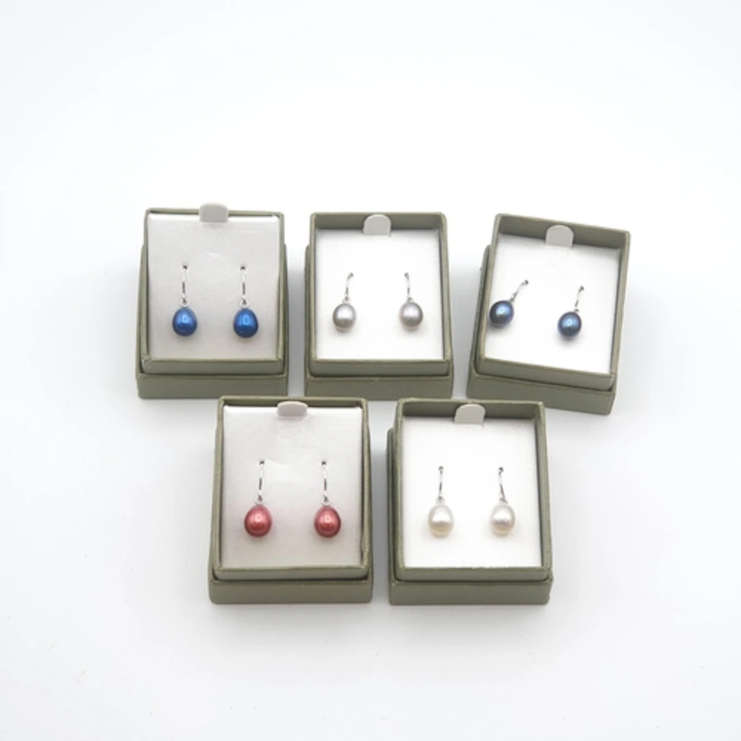 Five sets of Honora Cultured Pearl Ear Pendants on white met...
