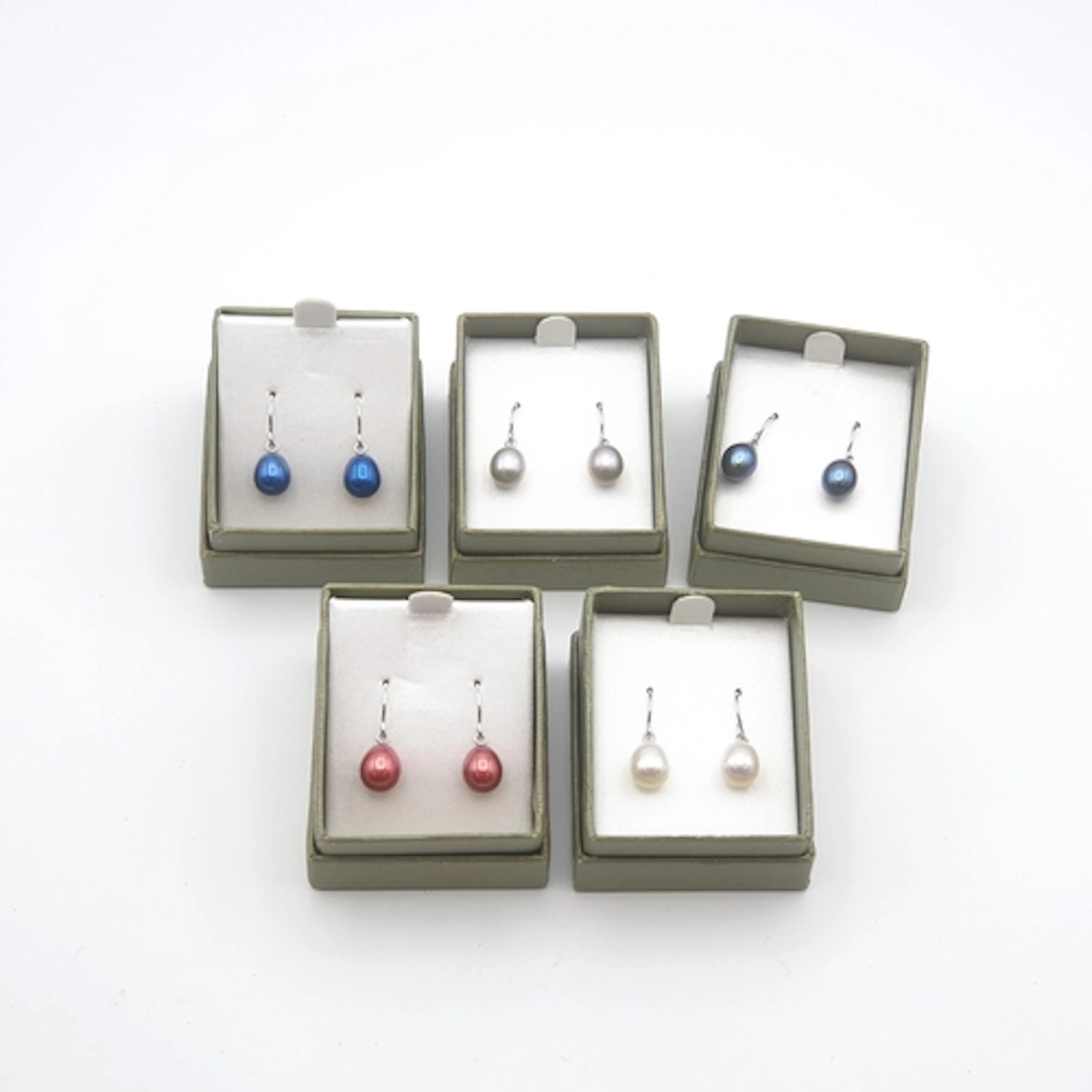 Five sets of Honora Cultured Pearl Ear Pendants on white met...