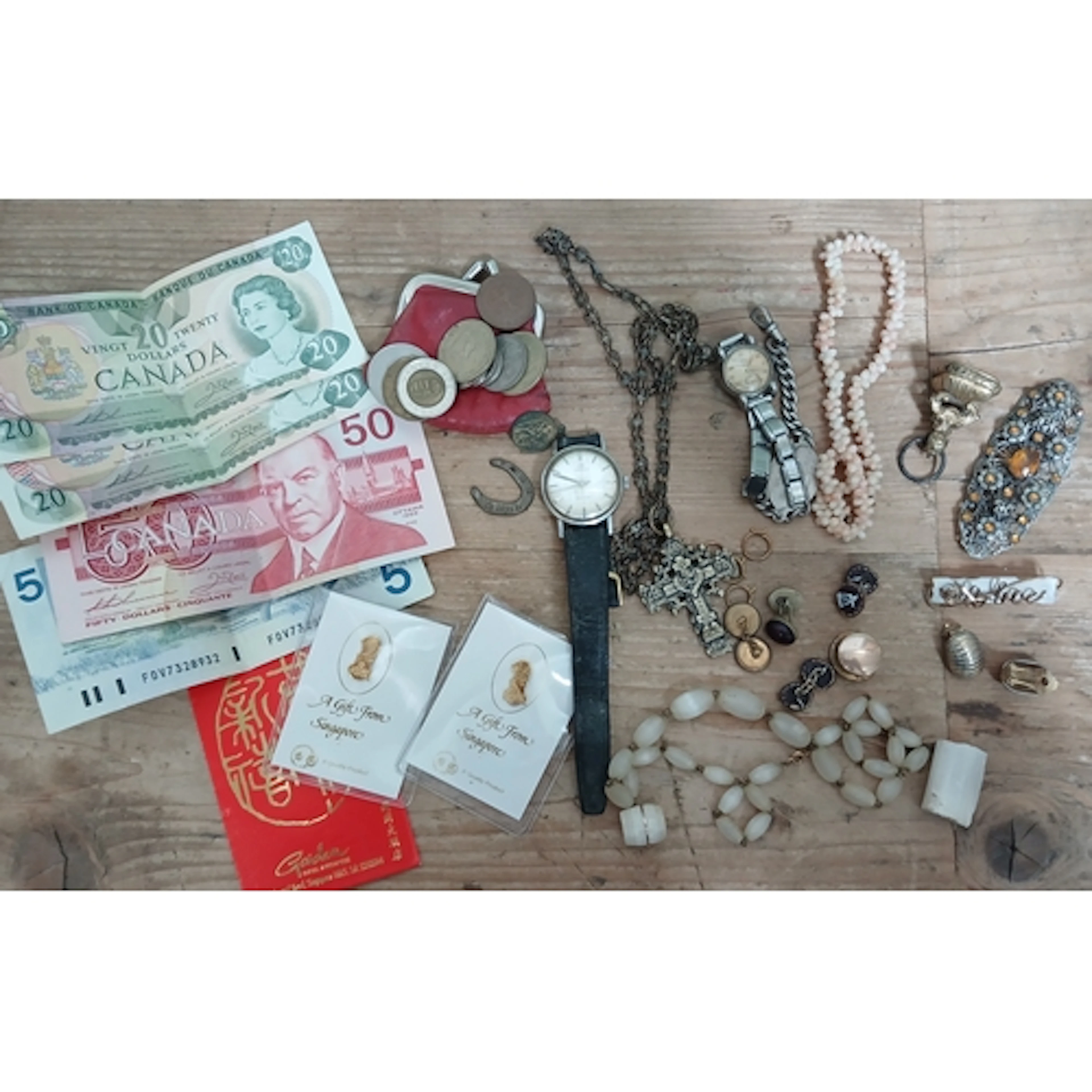 A mixed lot including watches, costume jewellery, an antique...