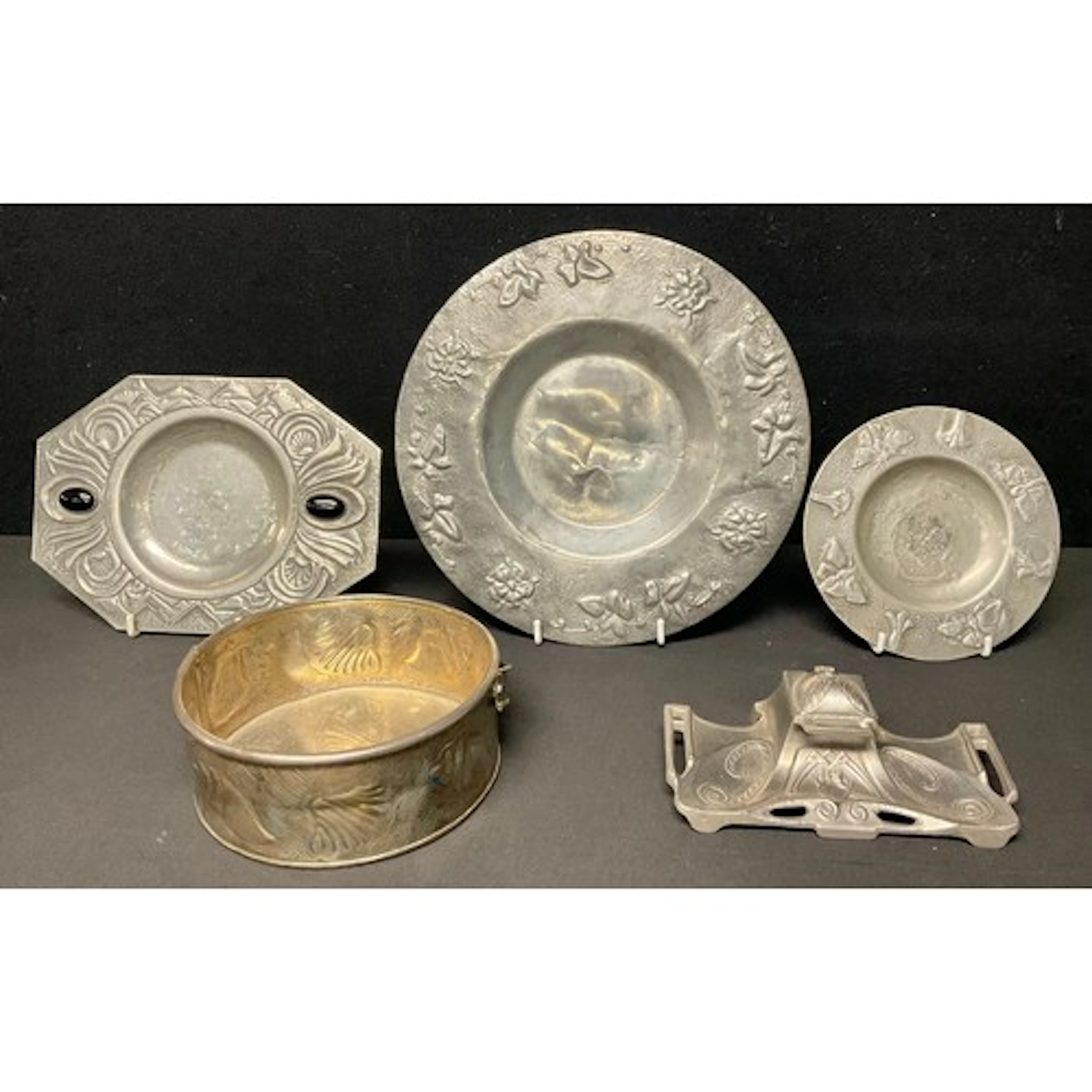 An Arts and Crafts design pewter dish, set with cabochons; ...