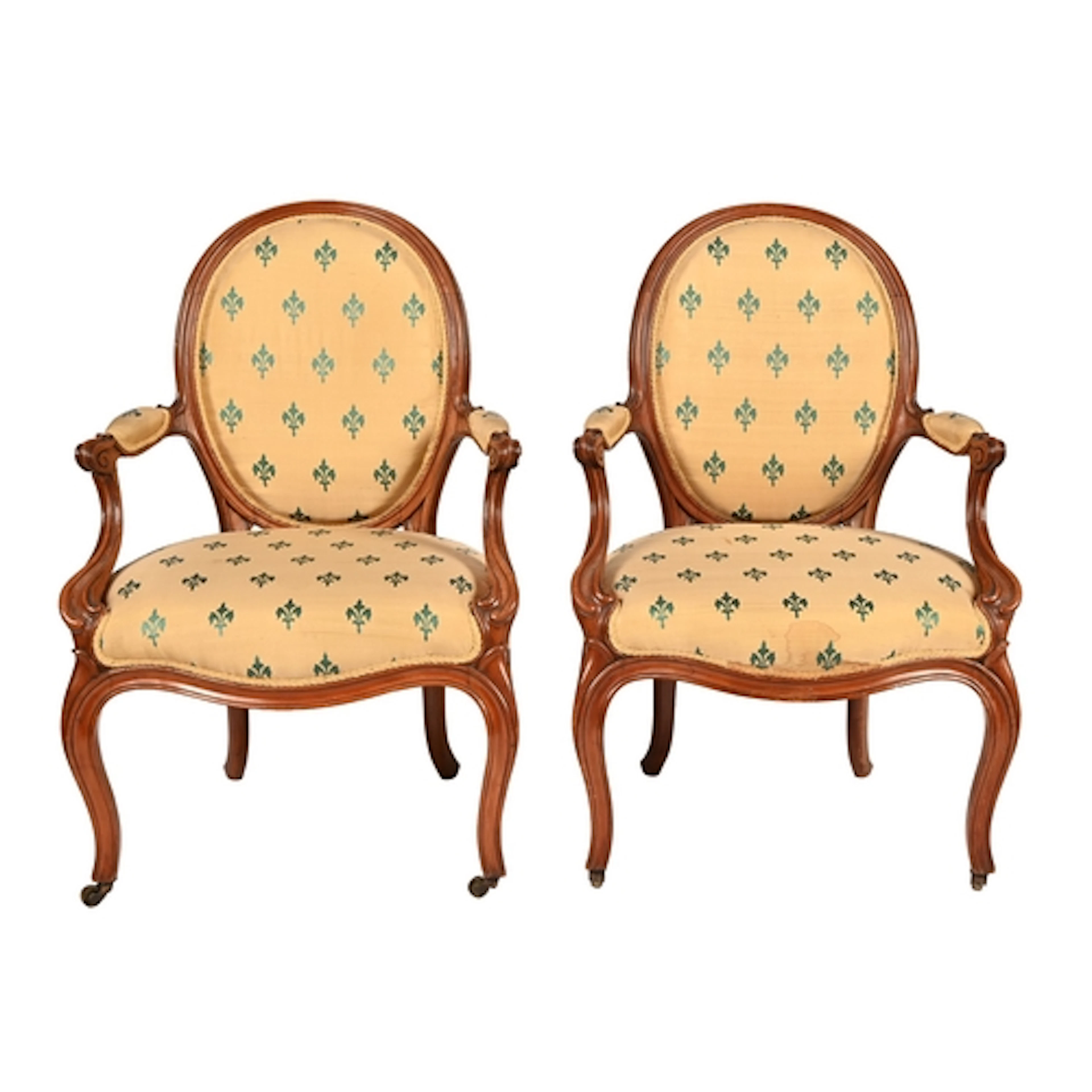 A pair of French cherrywood elbow chairs, early 20th c, in L...