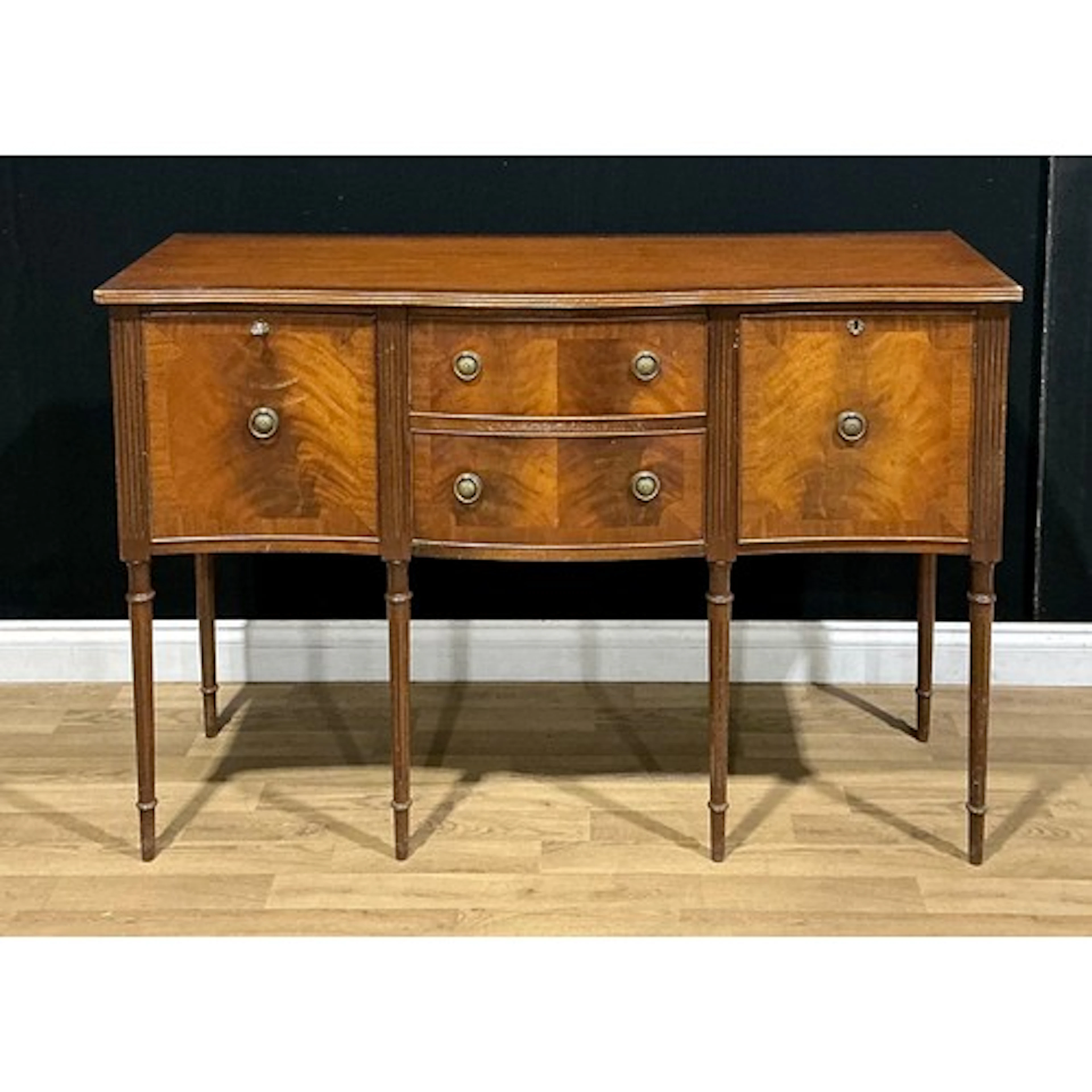 A Regency style sideboard or serving table, 137.5cm wide