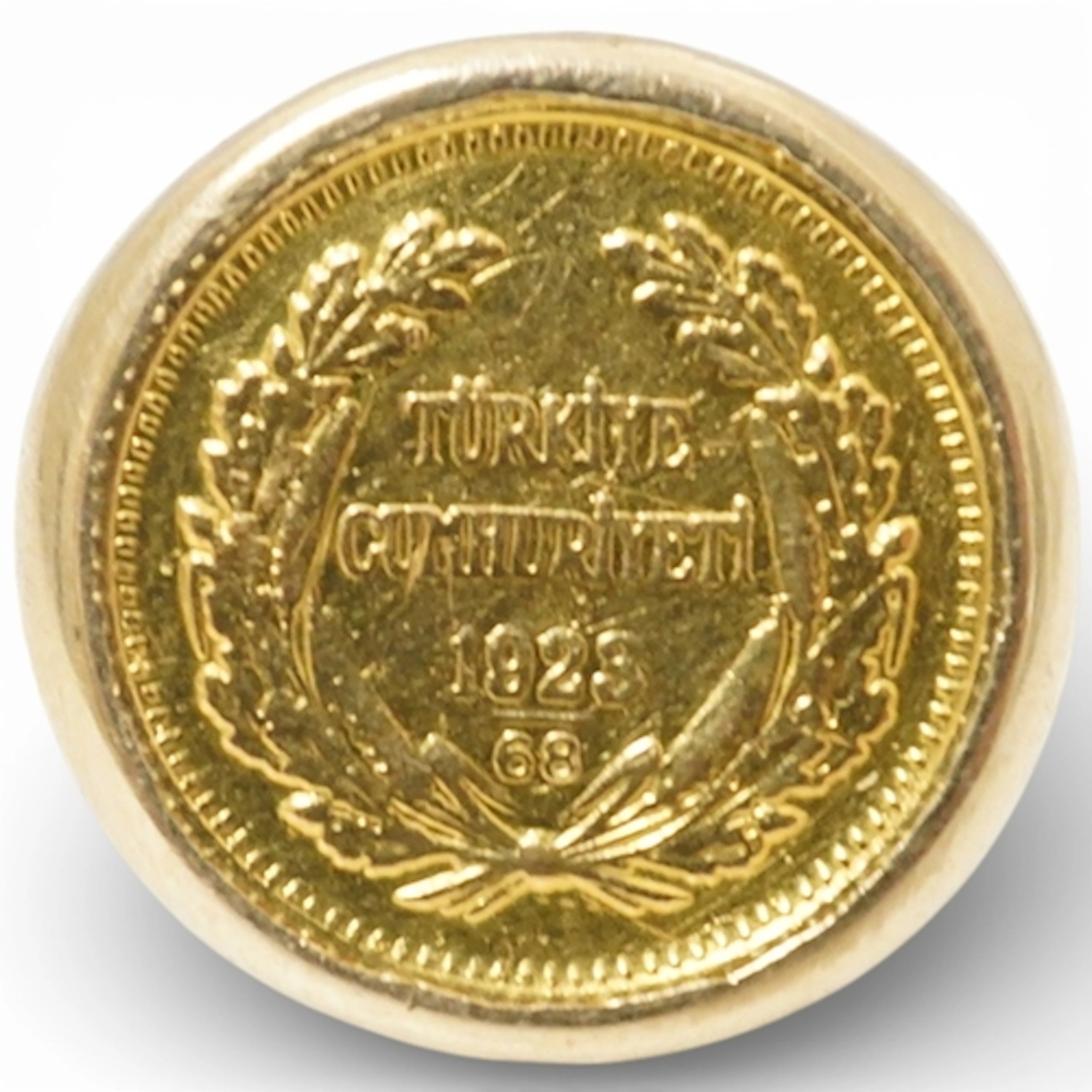 A 9ct gold ring, inset with a Turkish gold coin, size N, gro...