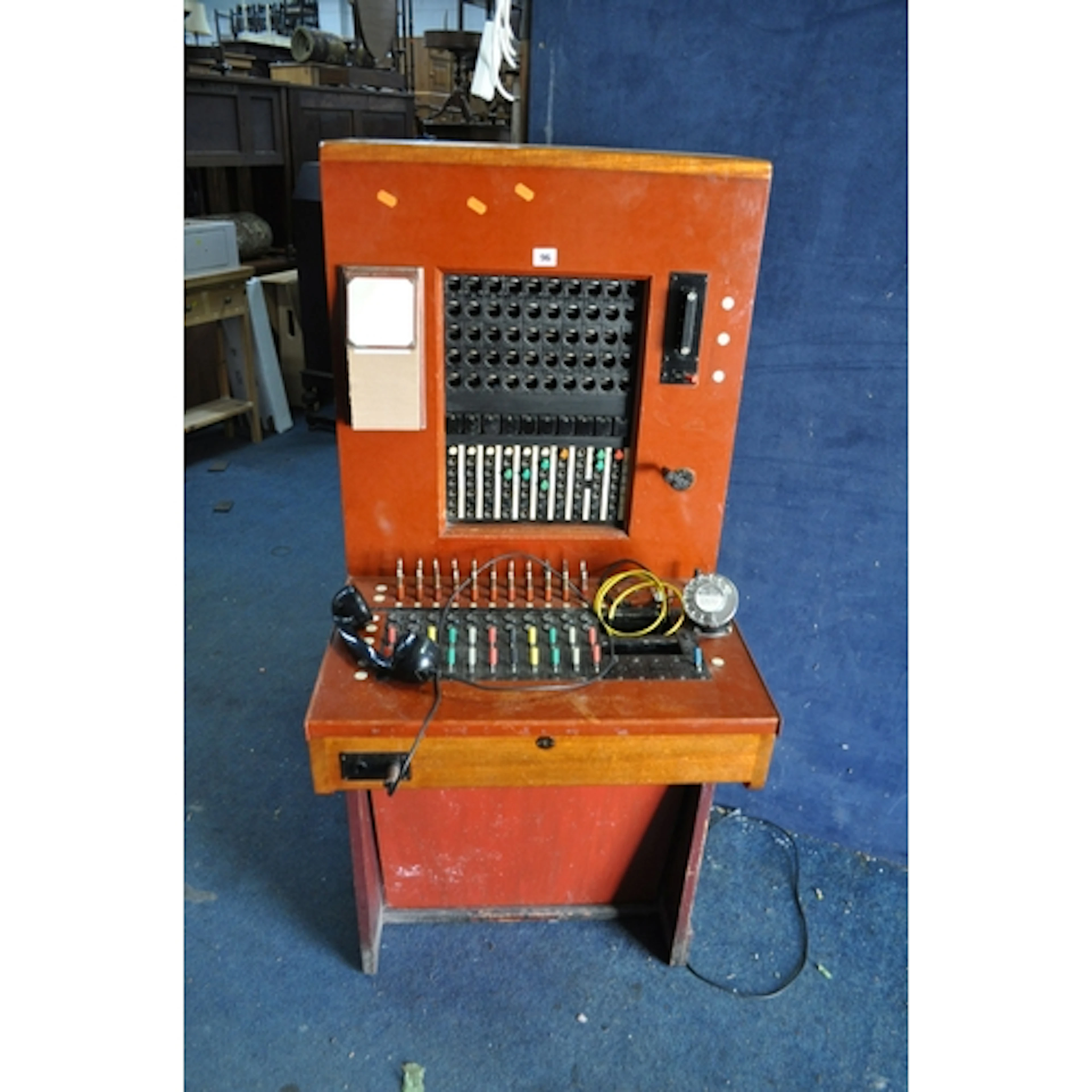 A MID 20th CENTURY TELEPHONE EXCHANGE with detachable handse...