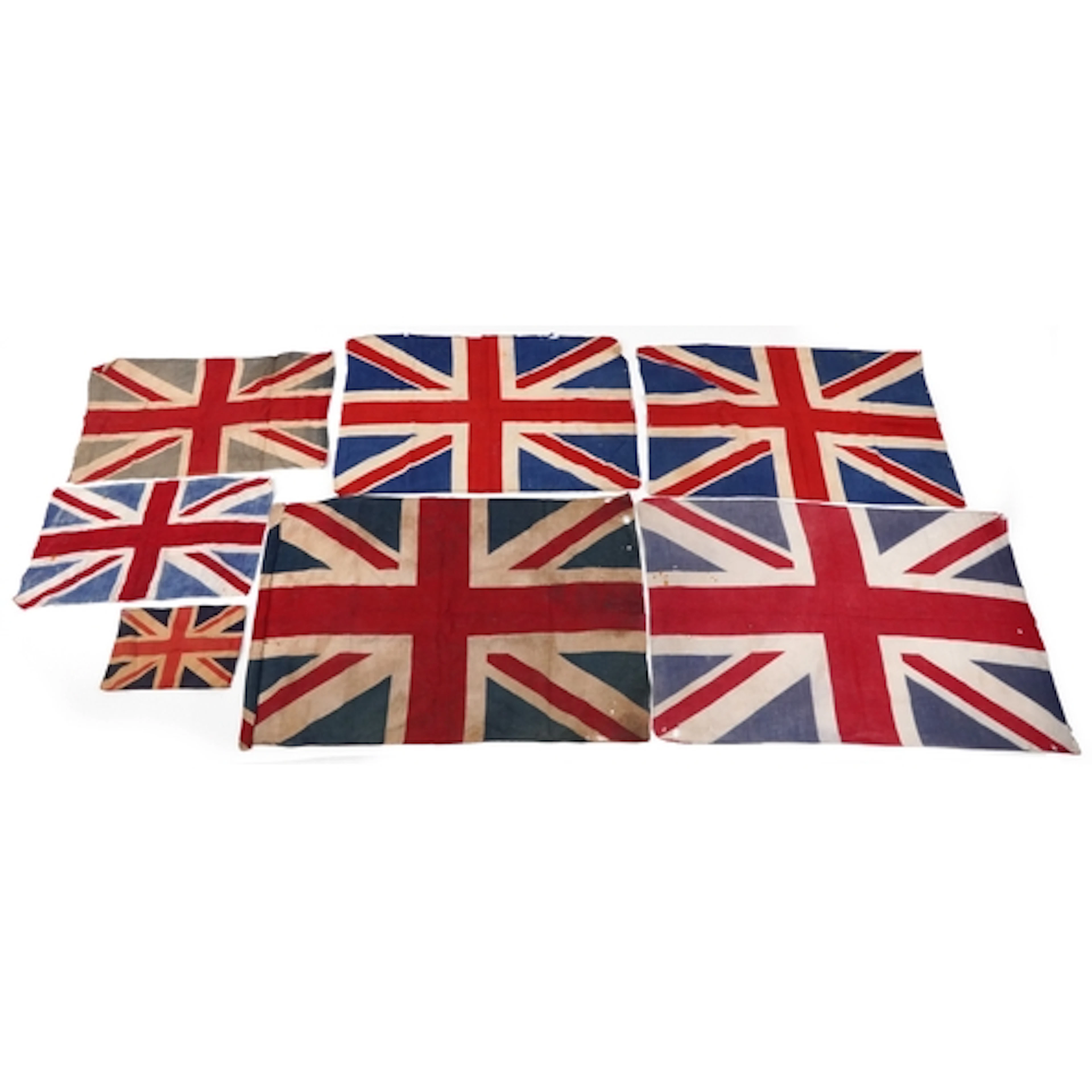 Seven vintage Union Jack flags, the largest 80cm in wide.