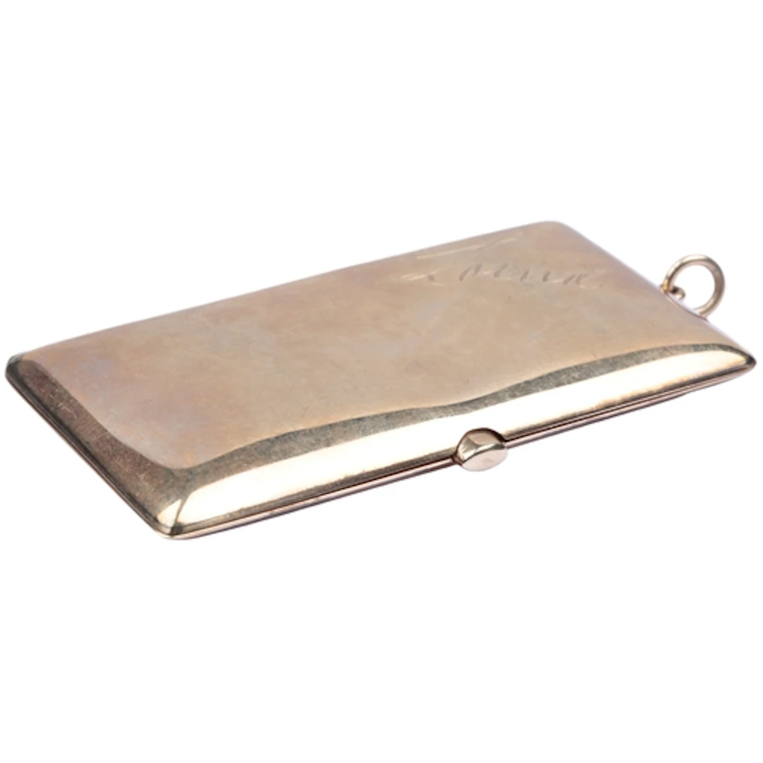 A gold cigarette case, circa 1908, of rectangular outline in...