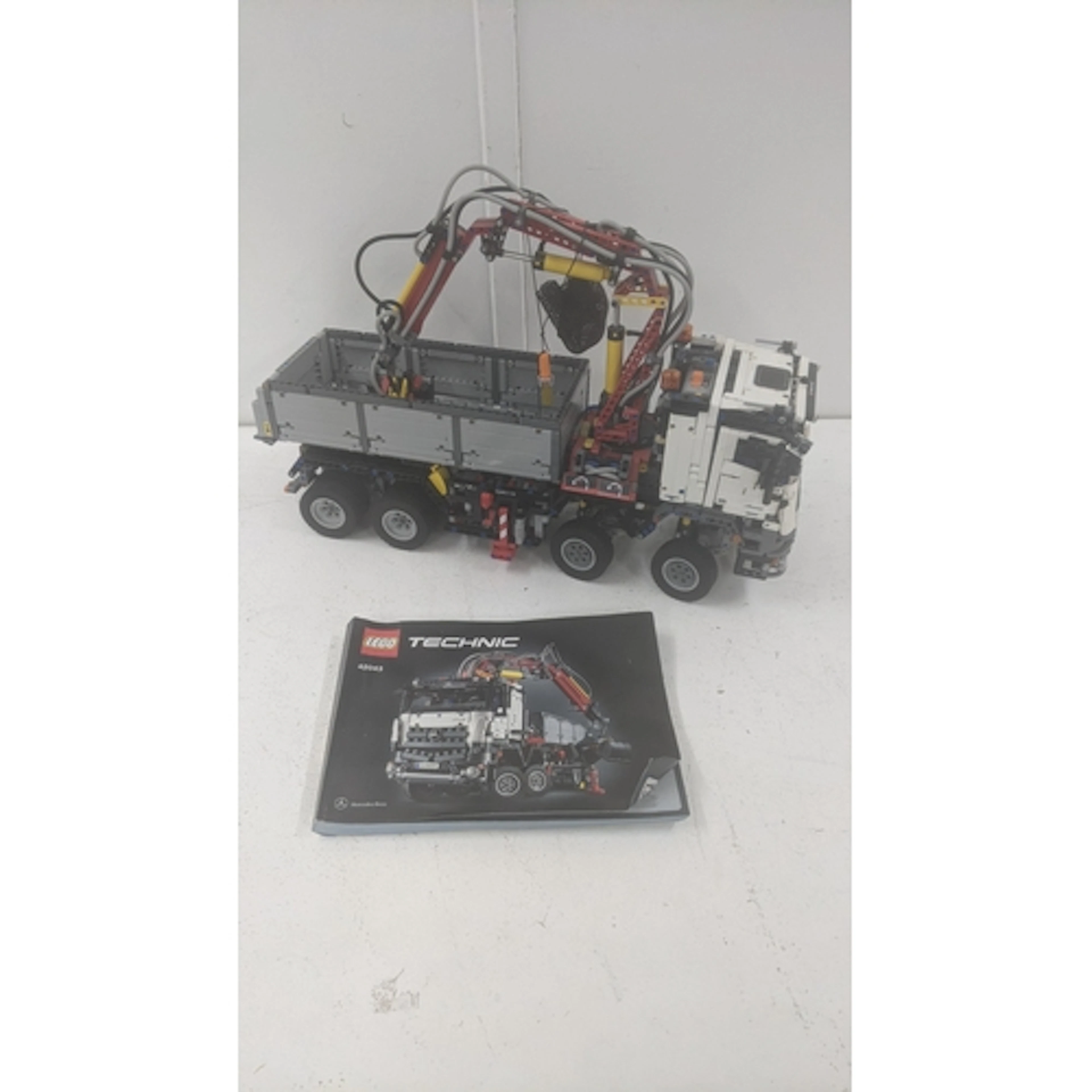 A Lego Technic 42043 Mercedes Benz grab lorry, assumed to be...
