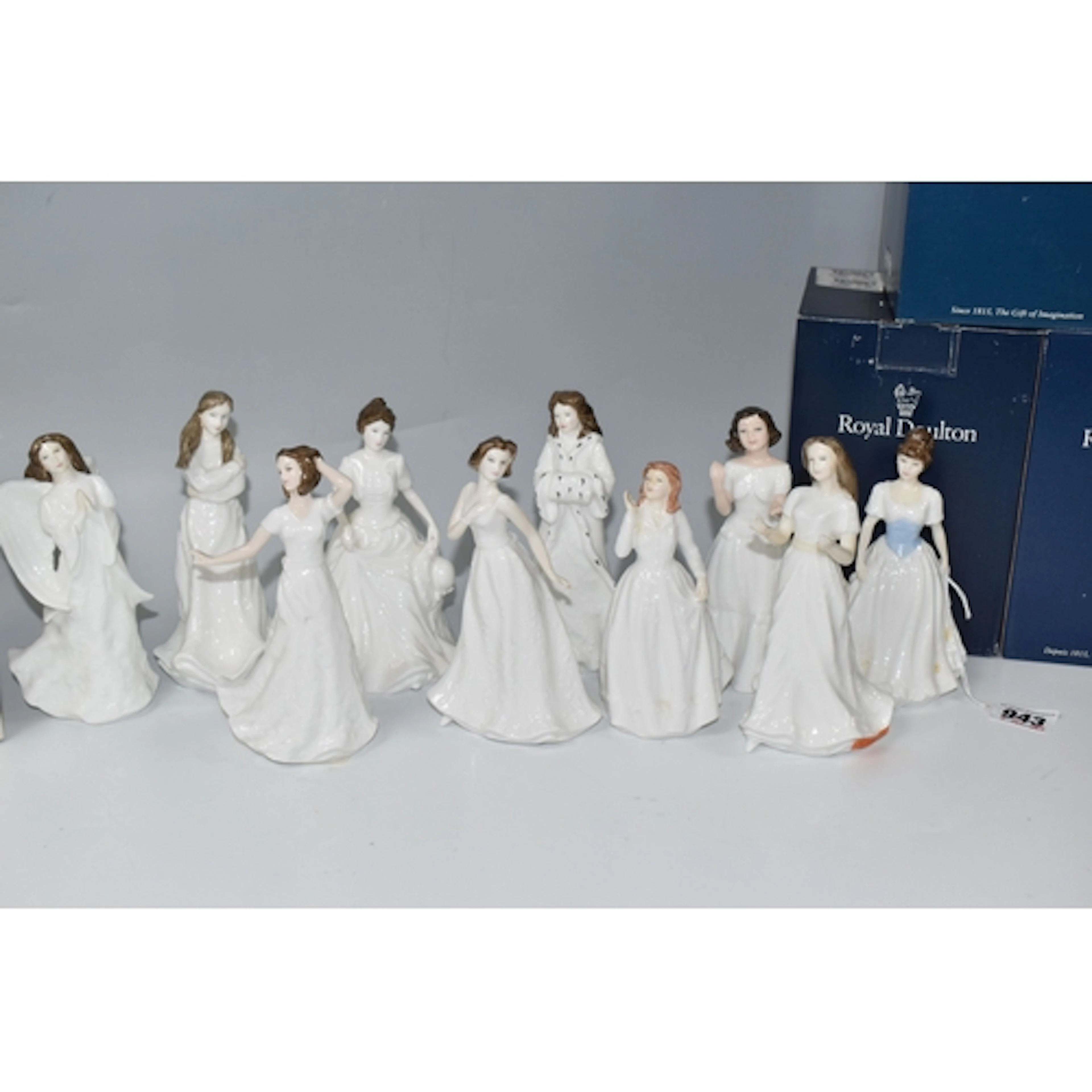 A GROUP OF ROYAL DOULTON FIGURINES, to include exclusive to ...