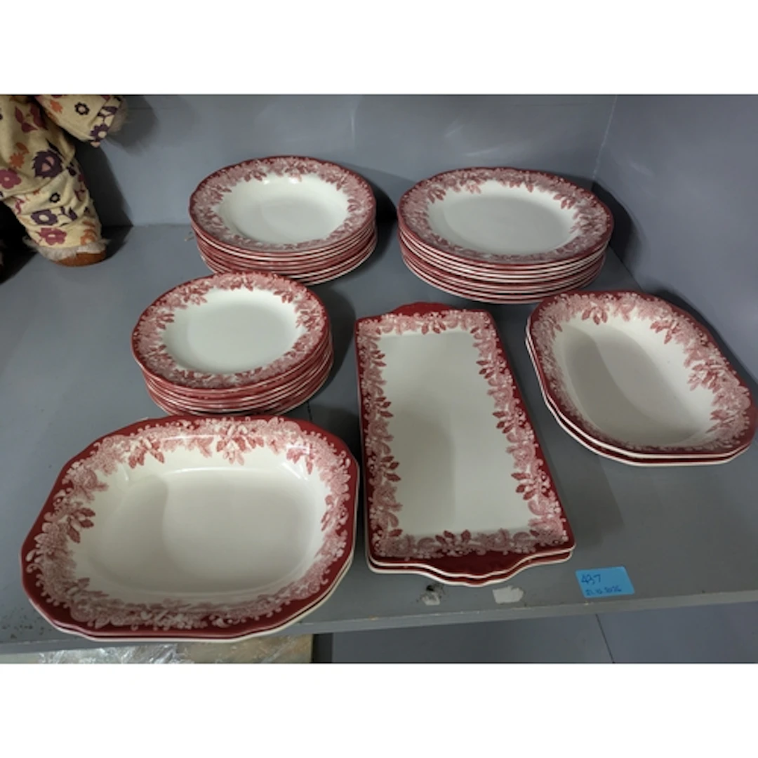 A Spode Winters Scene dinner service in tones of red Locatio...