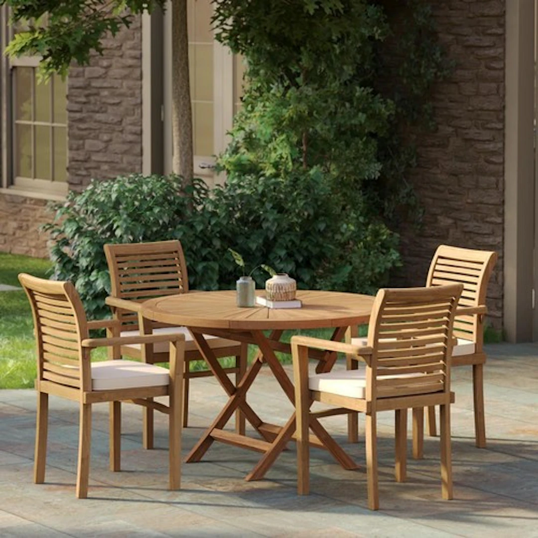 A good Teak circular table and four Chairs with central hole...