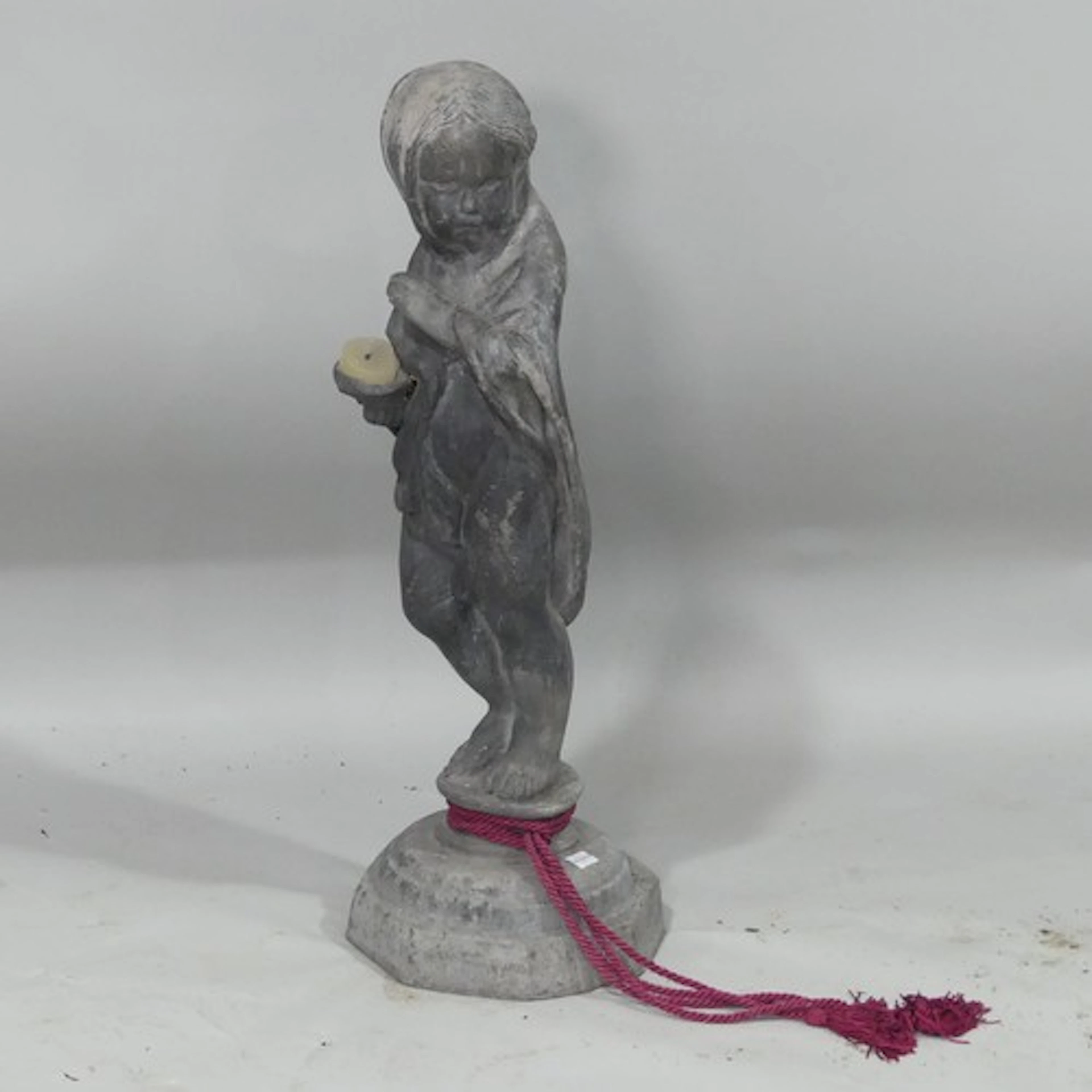 An antique lead garden figure of a girl, 67cm high....