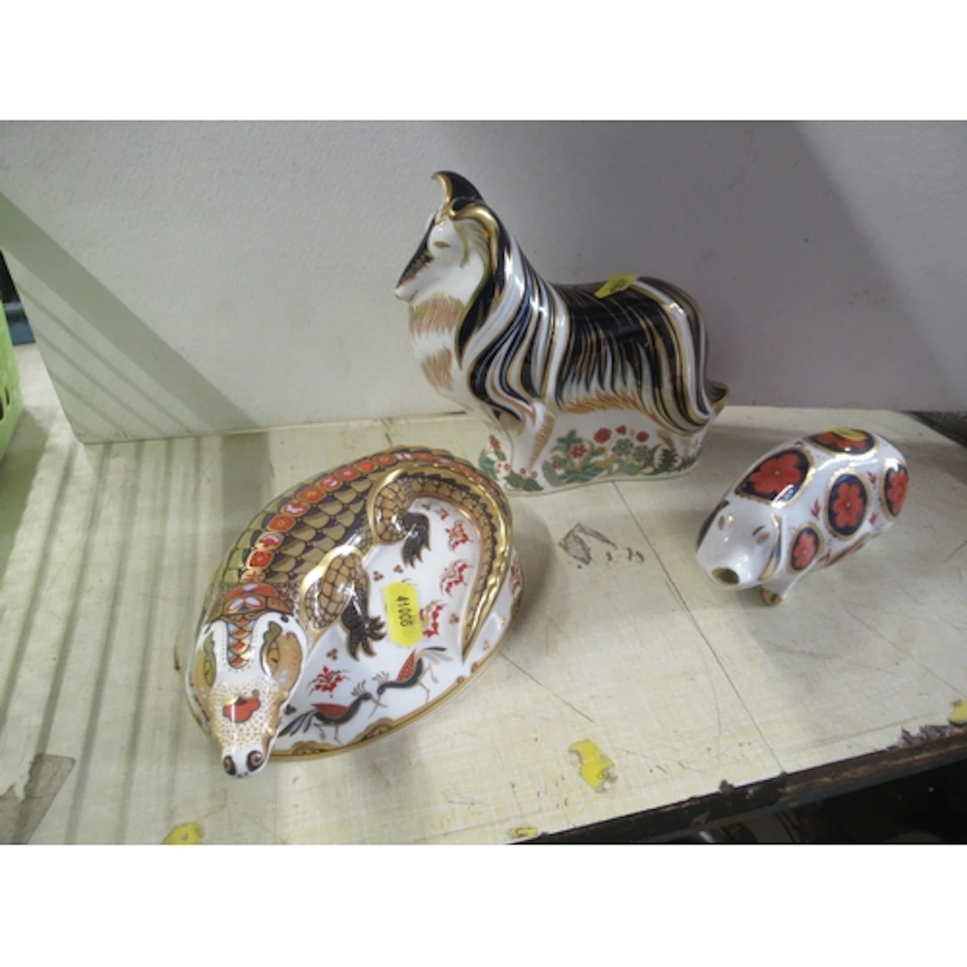 Three Royal Crown Derby paperweights, Collie dog, crocodile ...