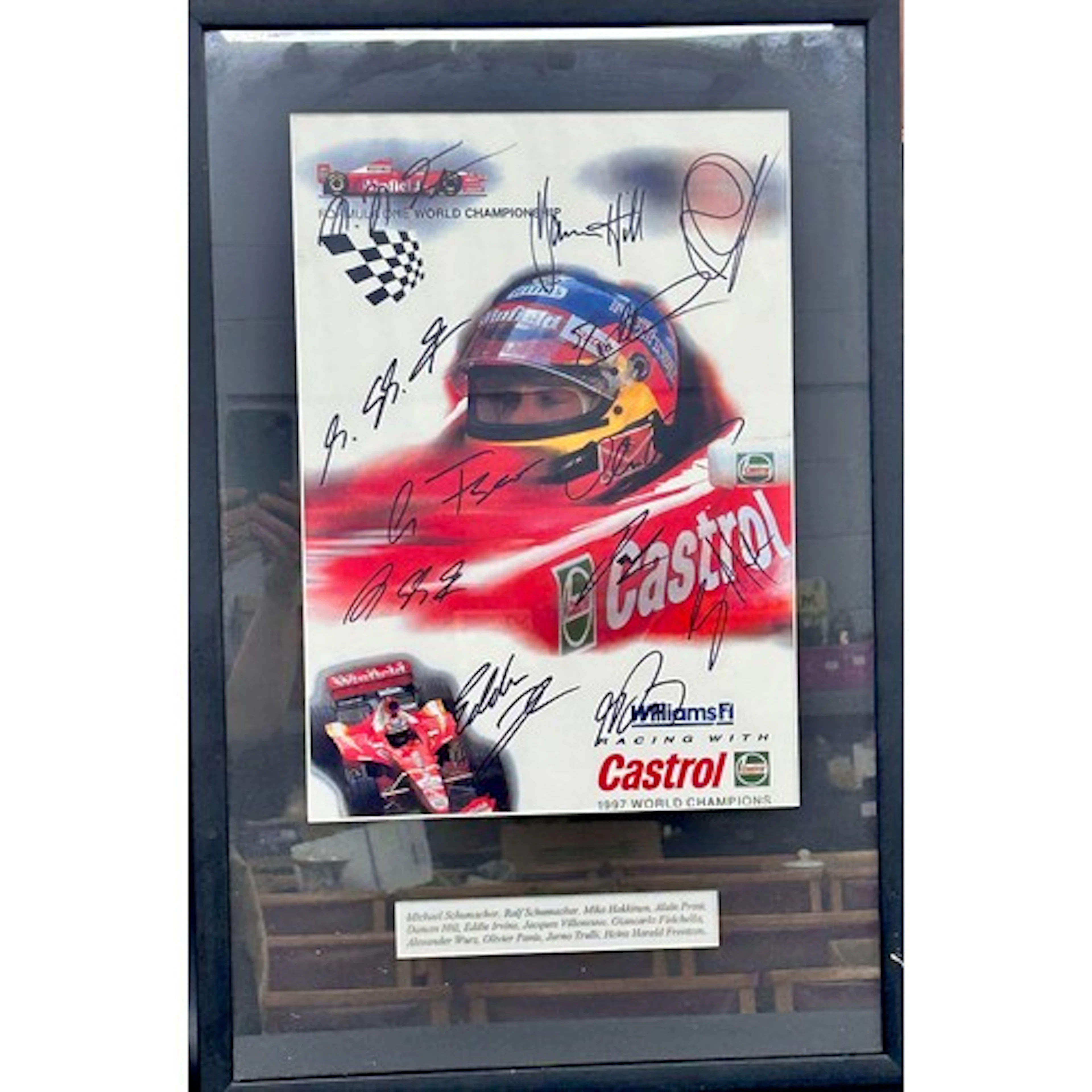 A signed F1 poster including Michael Schumacher, Alain Prost...