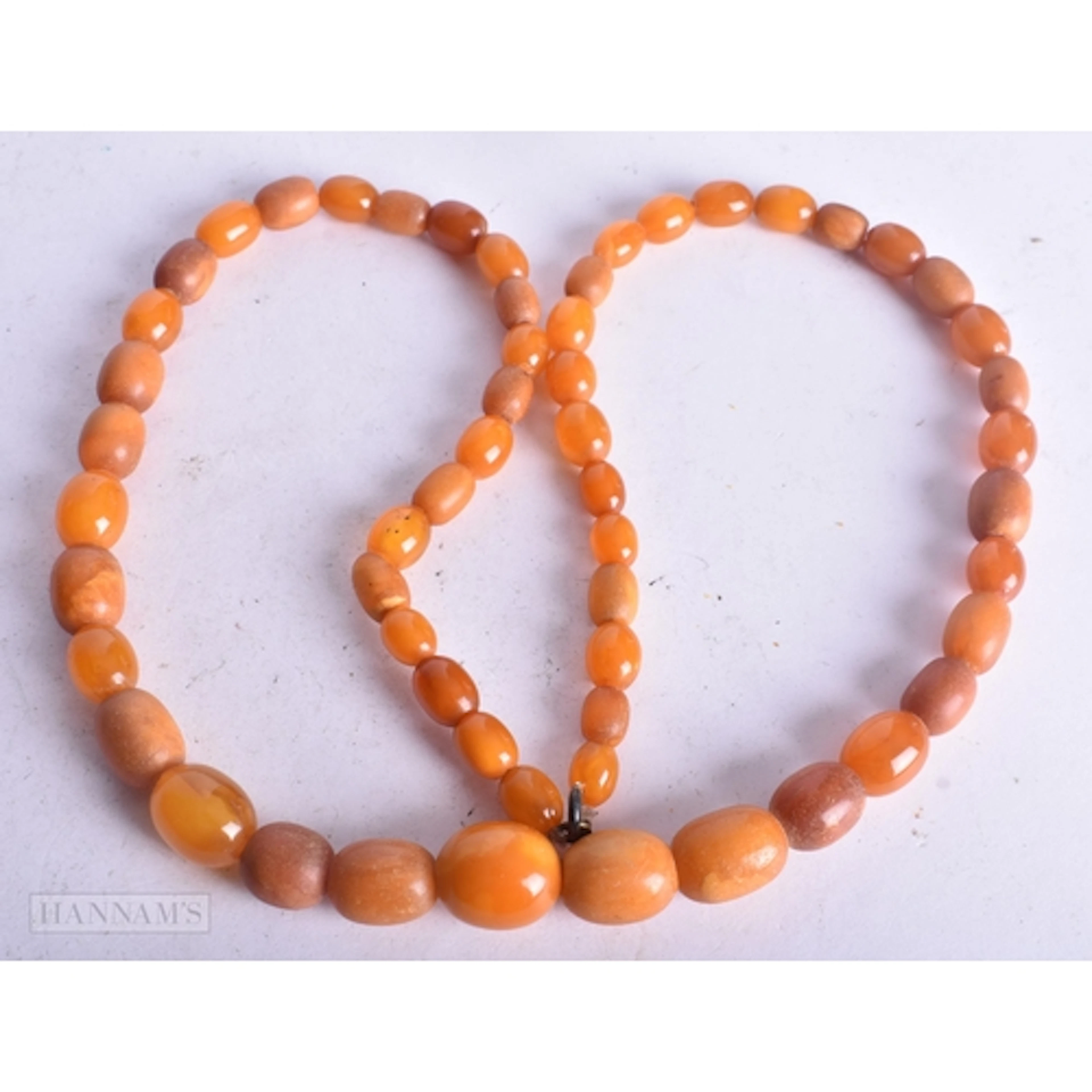 Graduated Butterscotch Amber Necklace (38g). 58 cm long, lar...