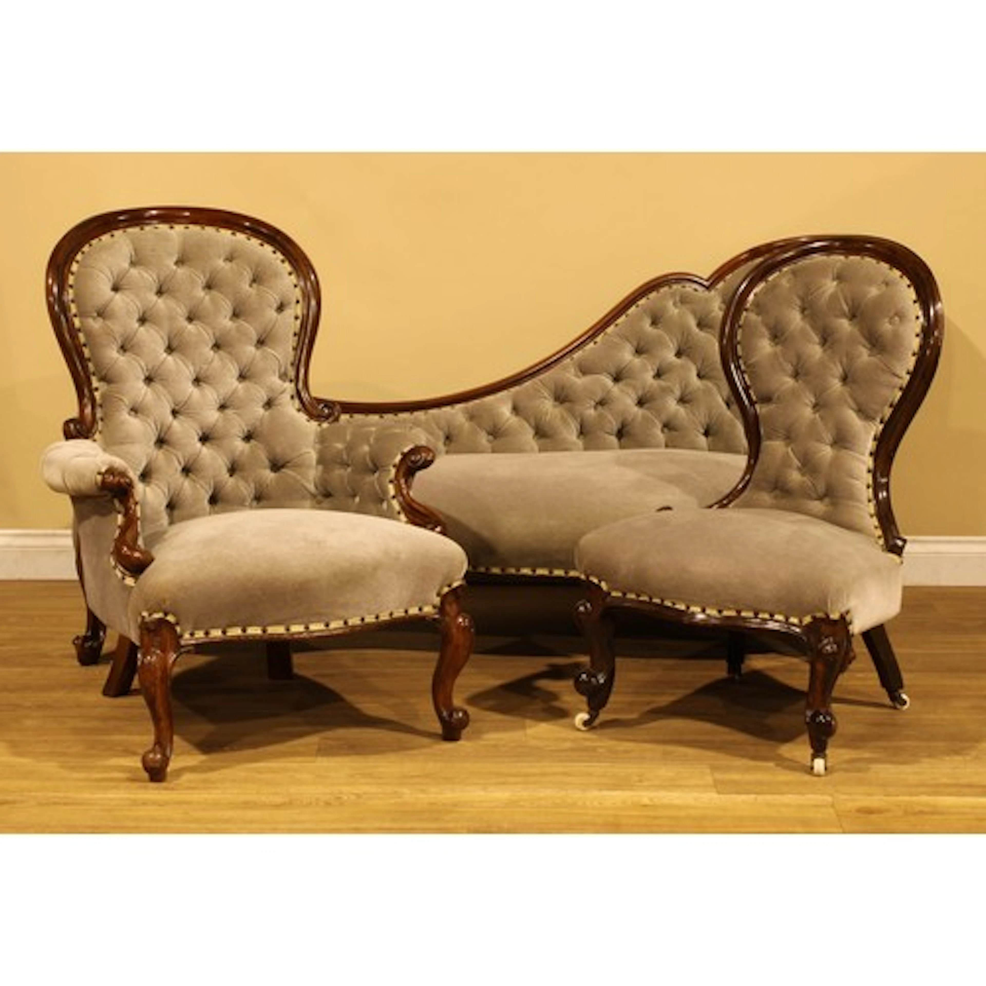 A Victorian style three-piece drawing room suite, comprising...