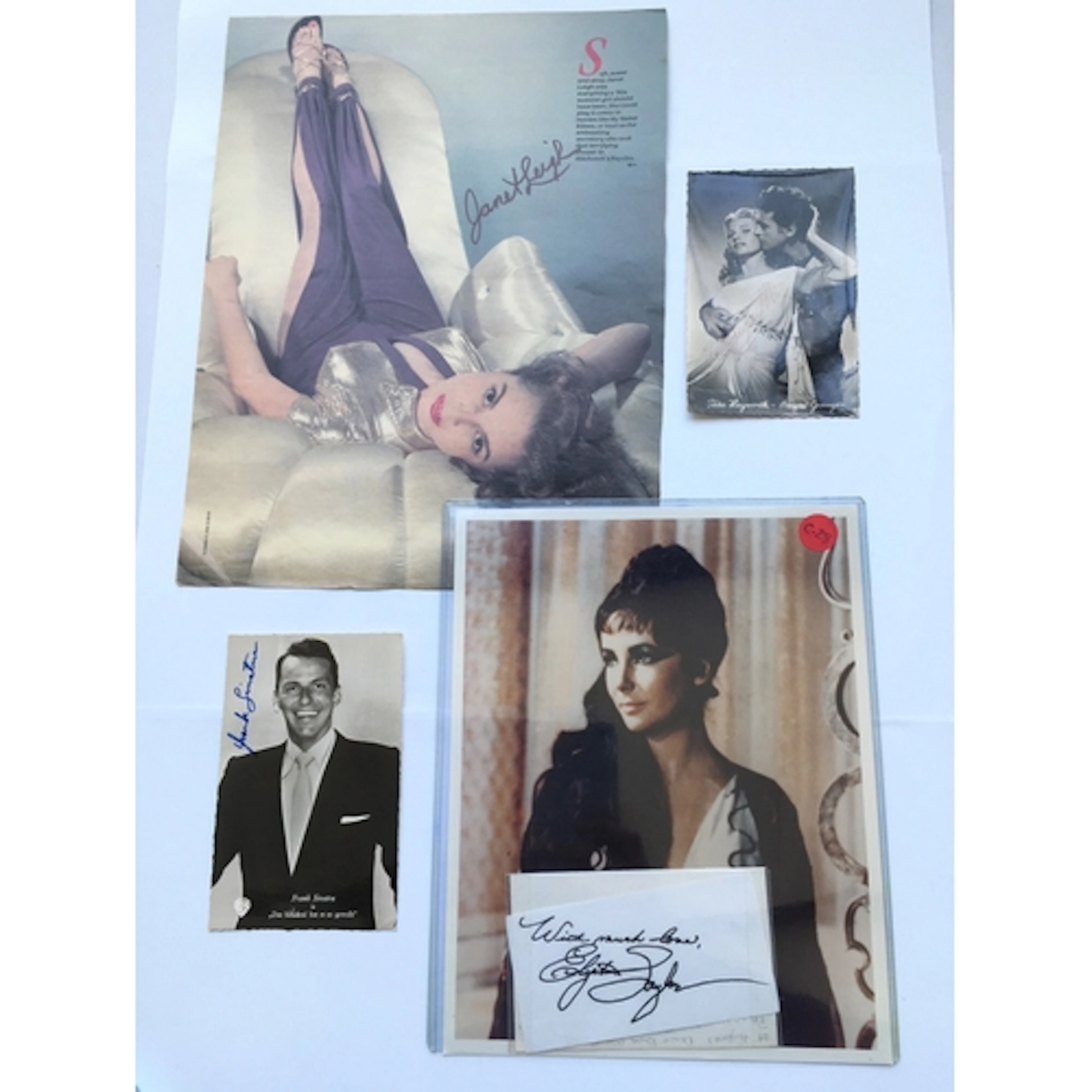 Four autographs comprising Elizabeth Taylor, Janet Leigh, Fr...