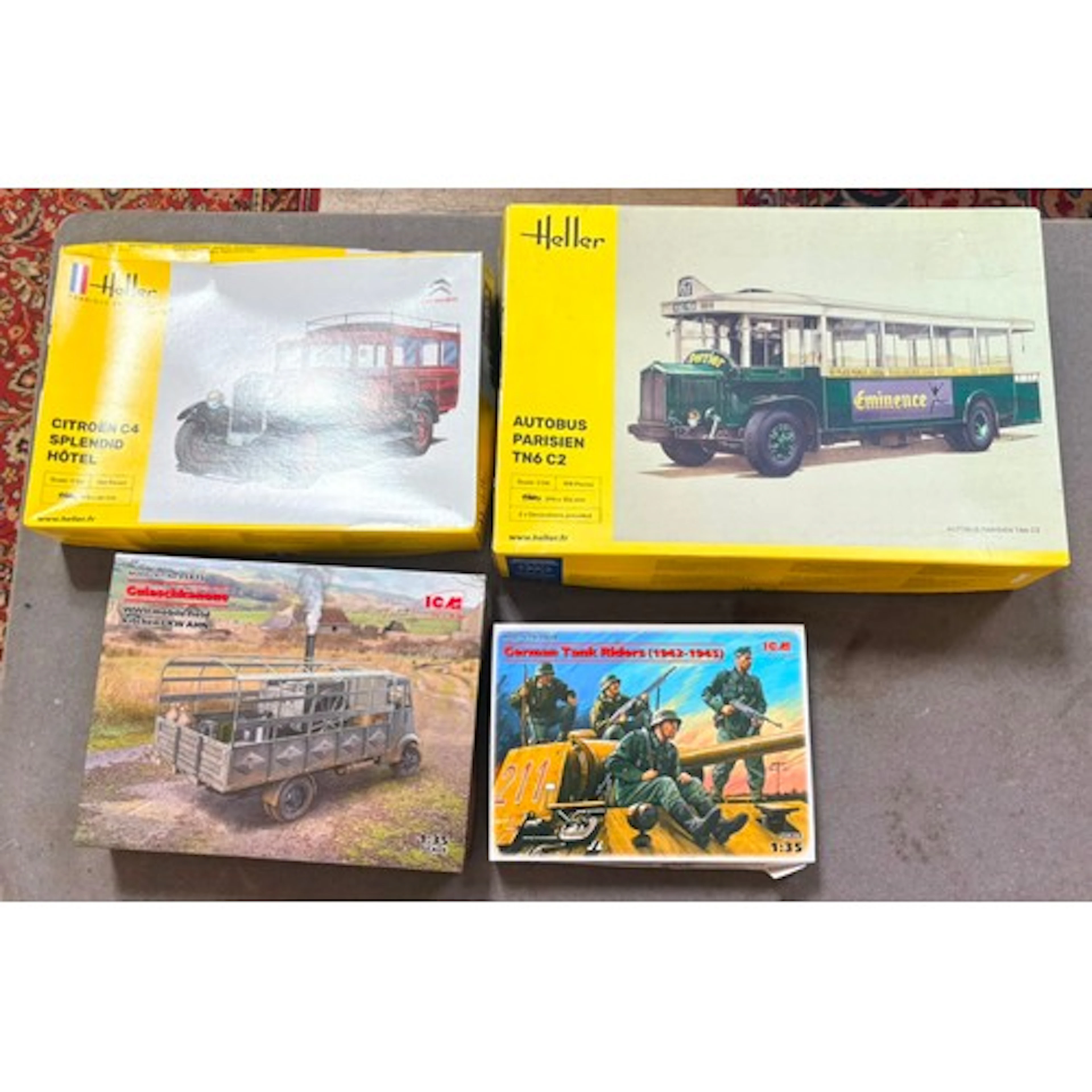 A group of four assorted model kits (2 x Heller 1:24 scale &...