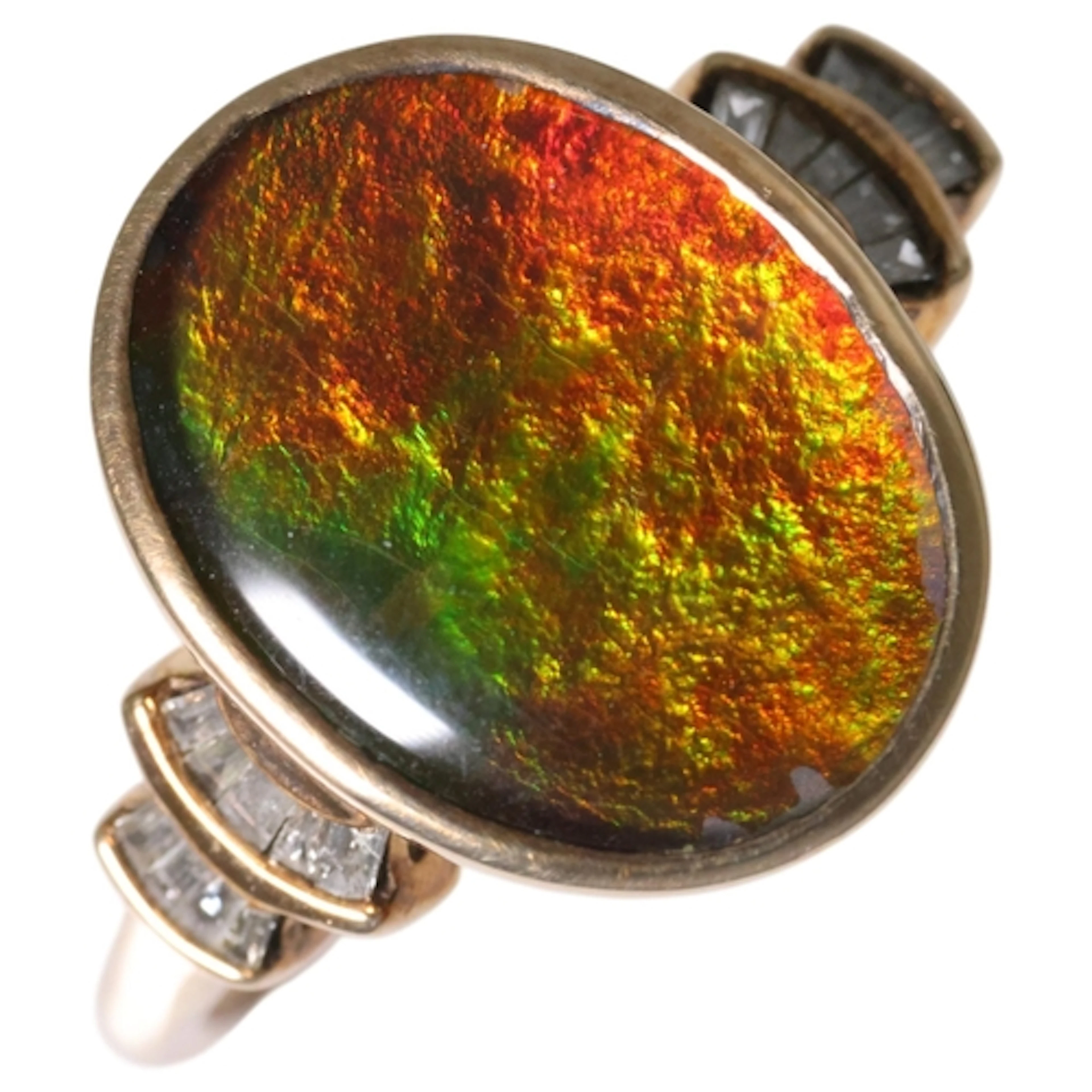 A 9ct gold ammolite and diamond ring, TJC, setting height 16...