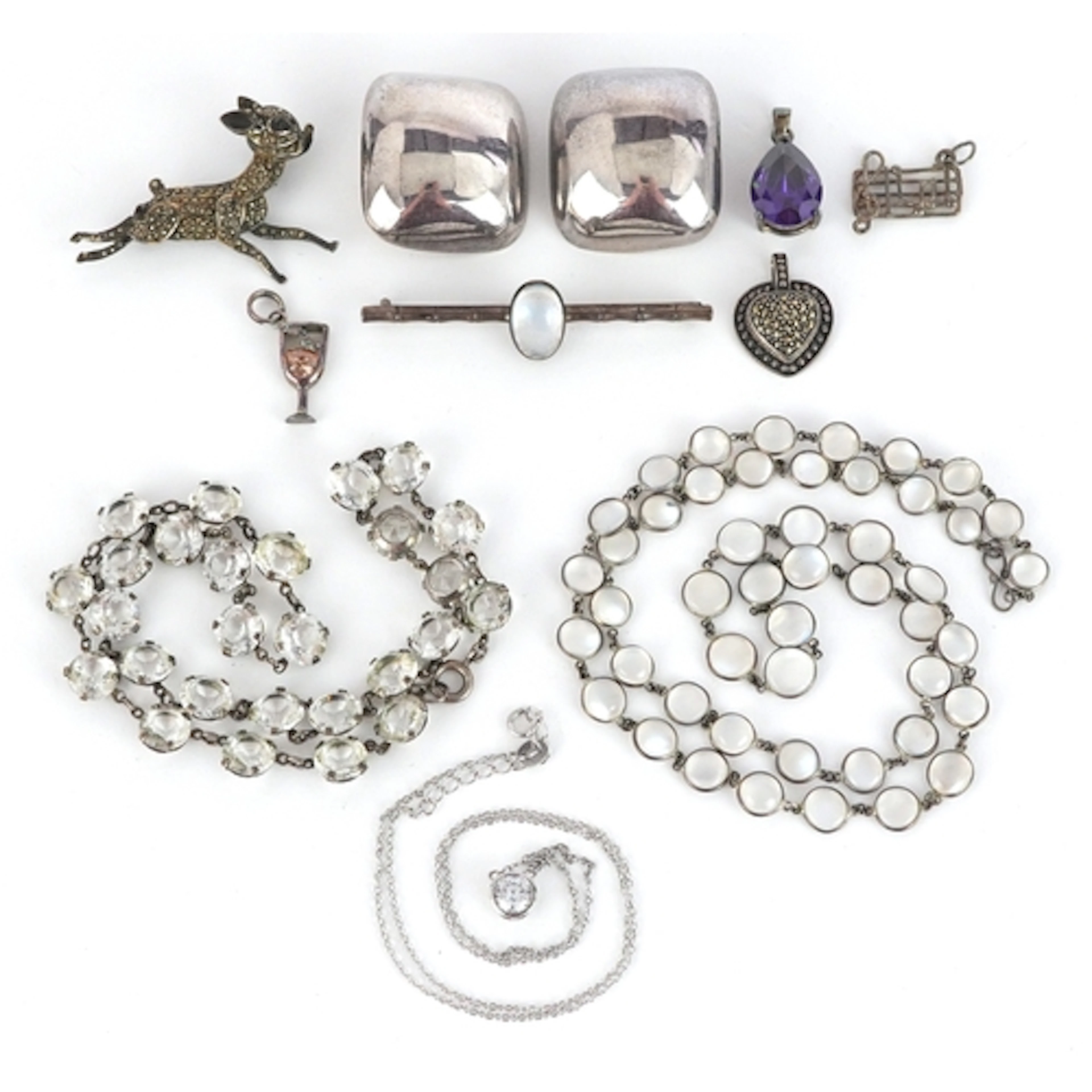 Antique and later silver jewellery including a cabochon moon...