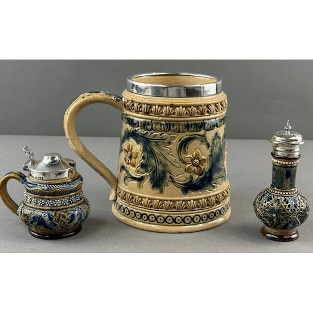 Ceramics: Doulton Lambeth- a silver rimmed tankard, decorate...